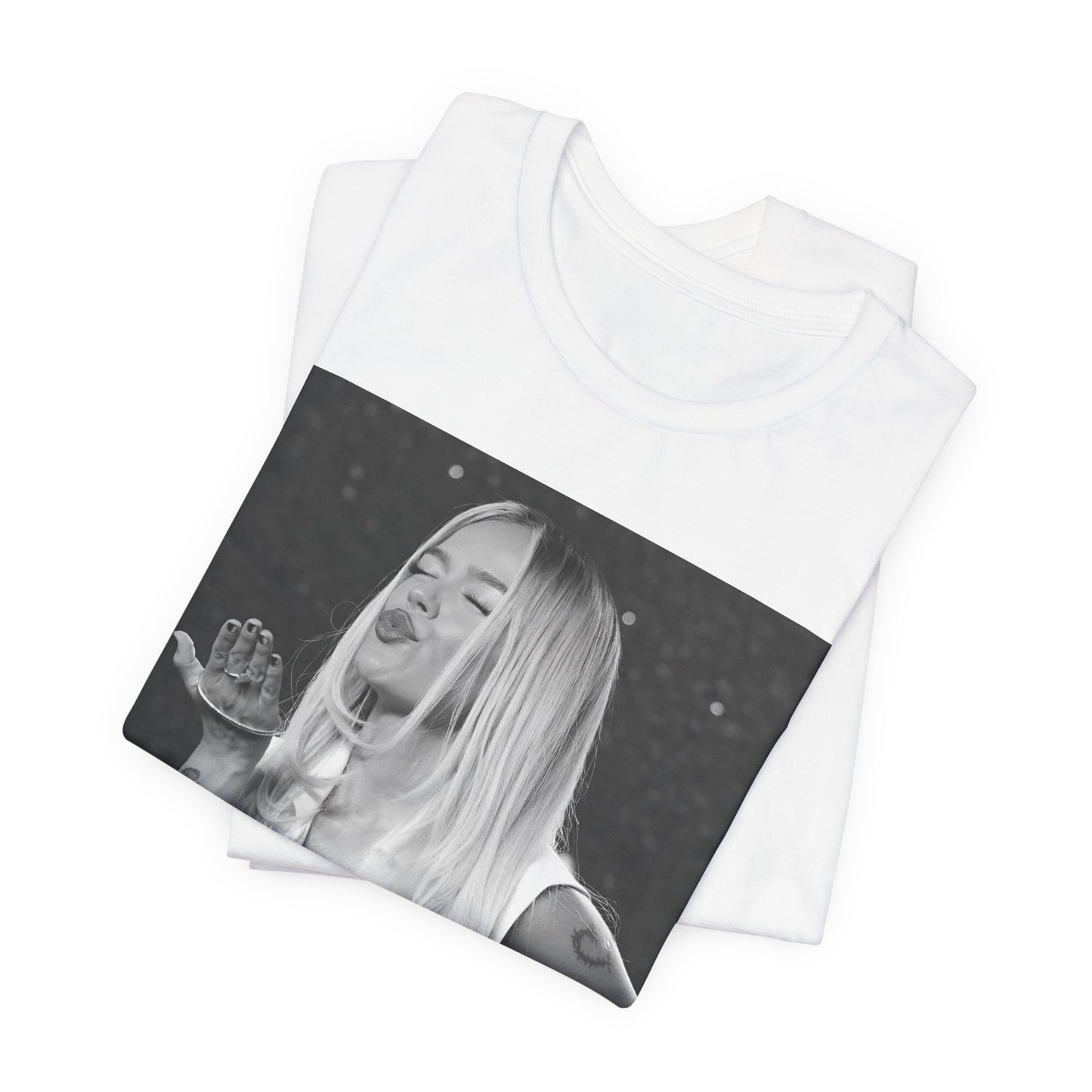A black graphic t-shirt featuring a graphic of Karol G with a 'La Bichota Kiss' theme.