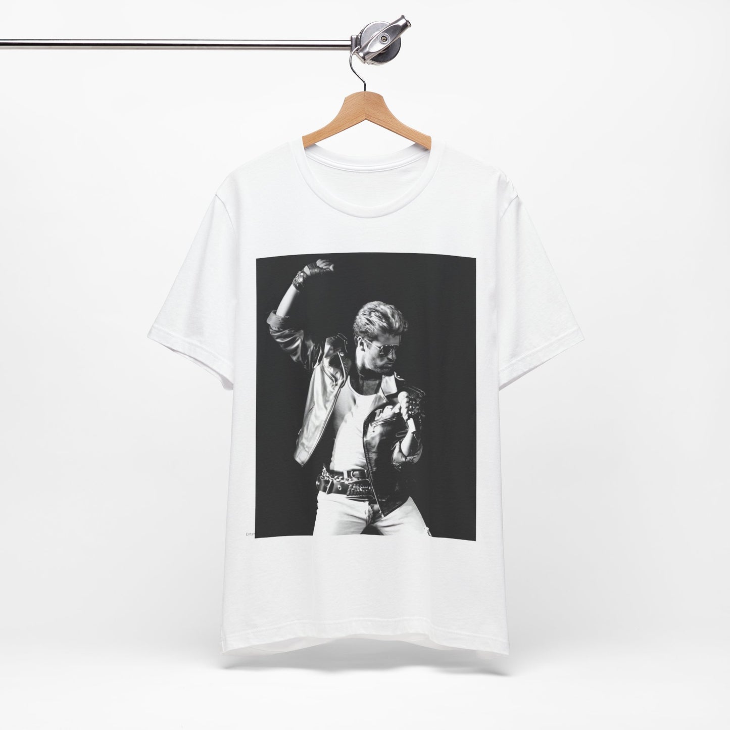 A black graphic t-shirt featuring an iconic black and white portrait photo of George Michael.