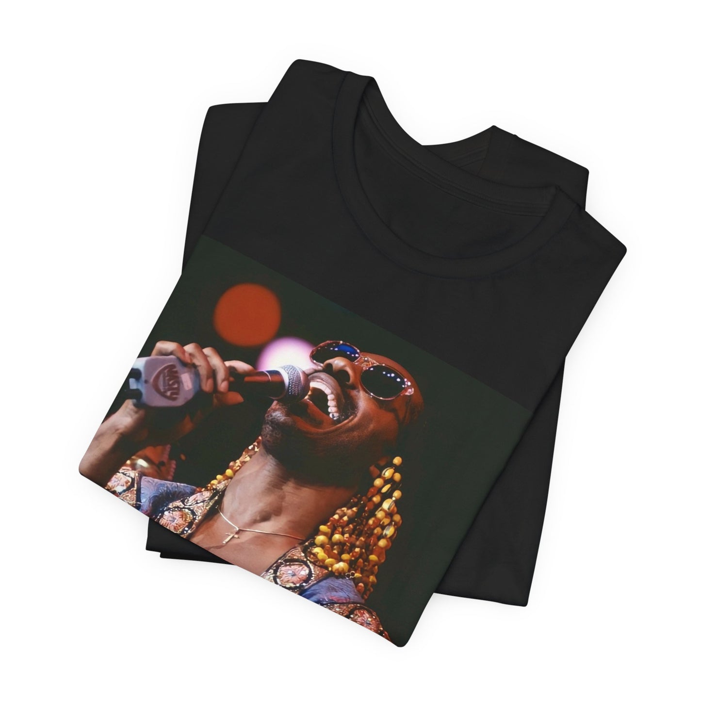 A black graphic t-shirt featuring a 70s vintage soul icon graphic of Stevie Wonder.