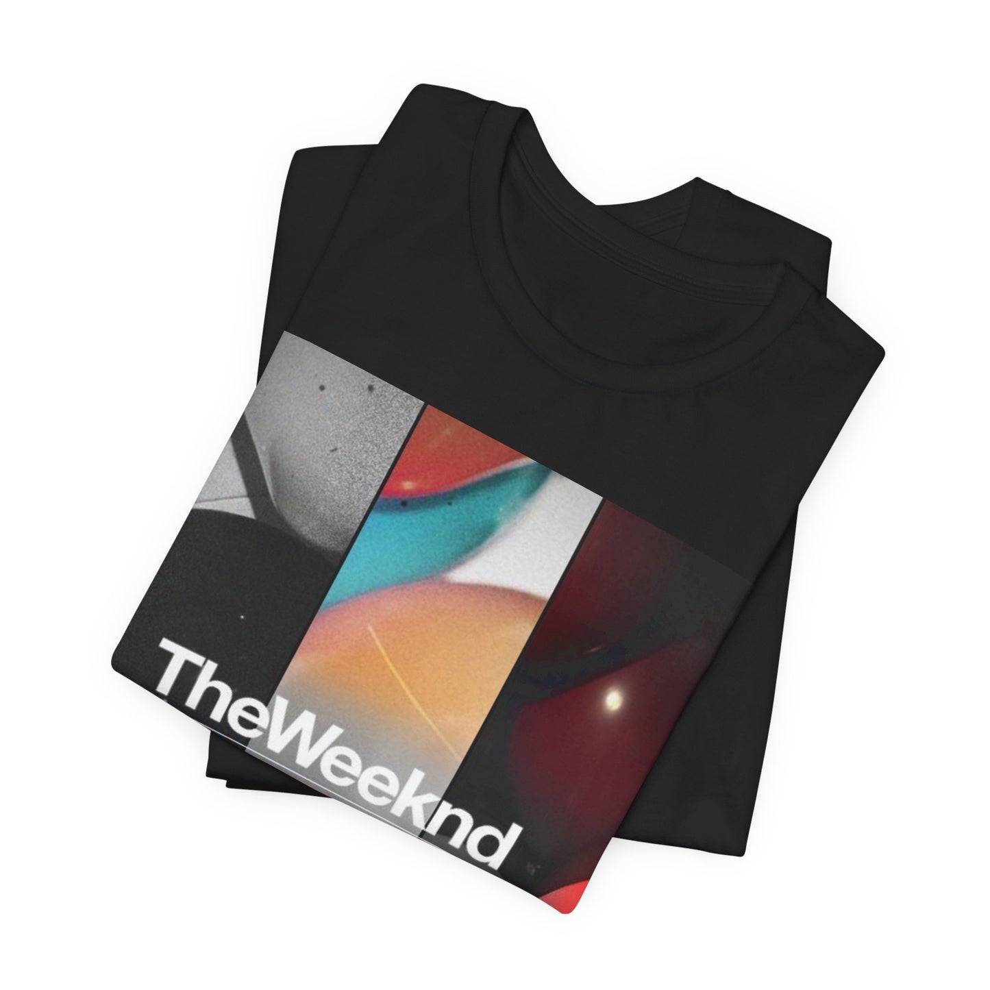 A black graphic t-shirt featuring a graphic related to The Weeknd's 'The Trilogy' album.