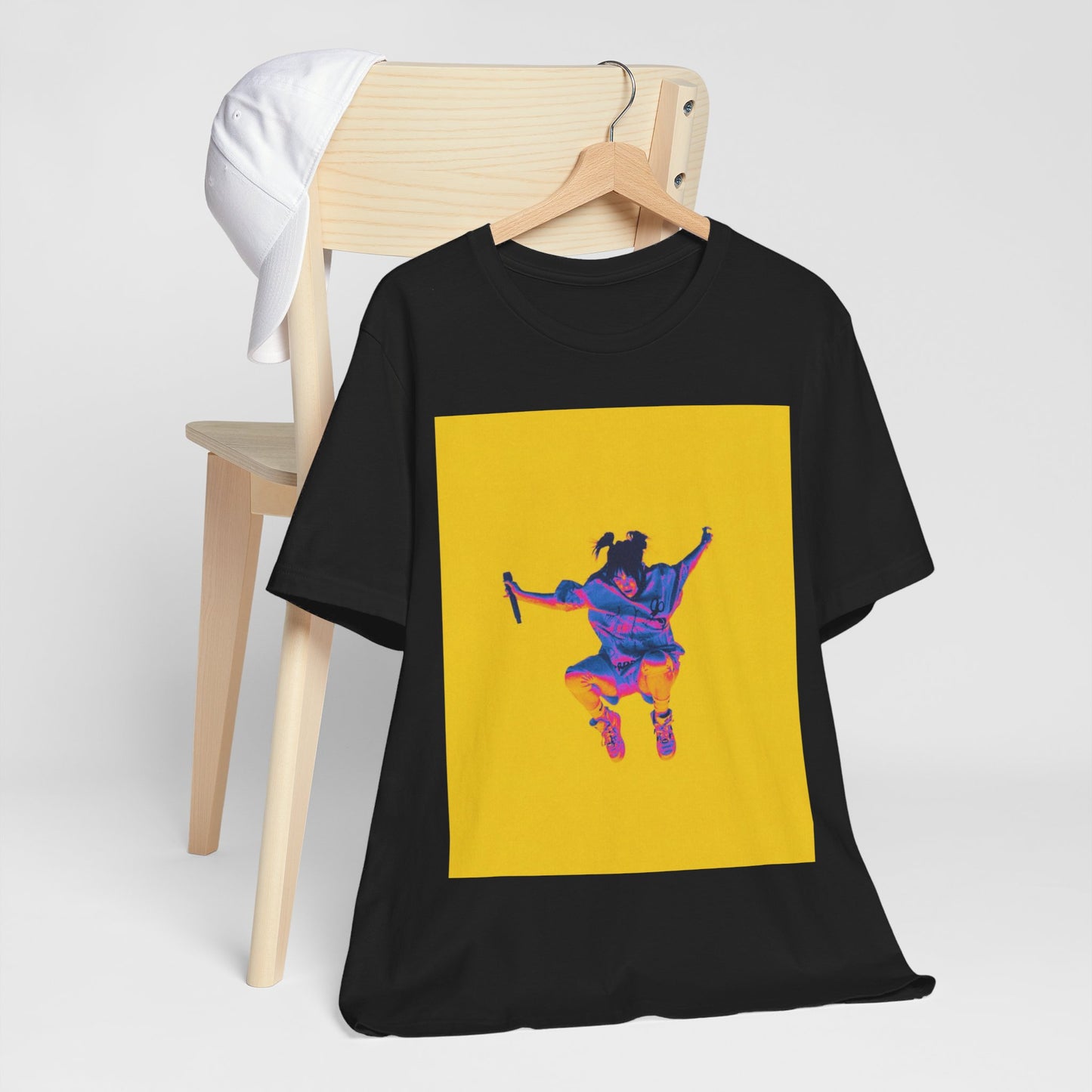 A stylized graphic of Billie Eilish jumping in the air with a microphone, rendered with psychedelic thermal colors against a solid yellow background.