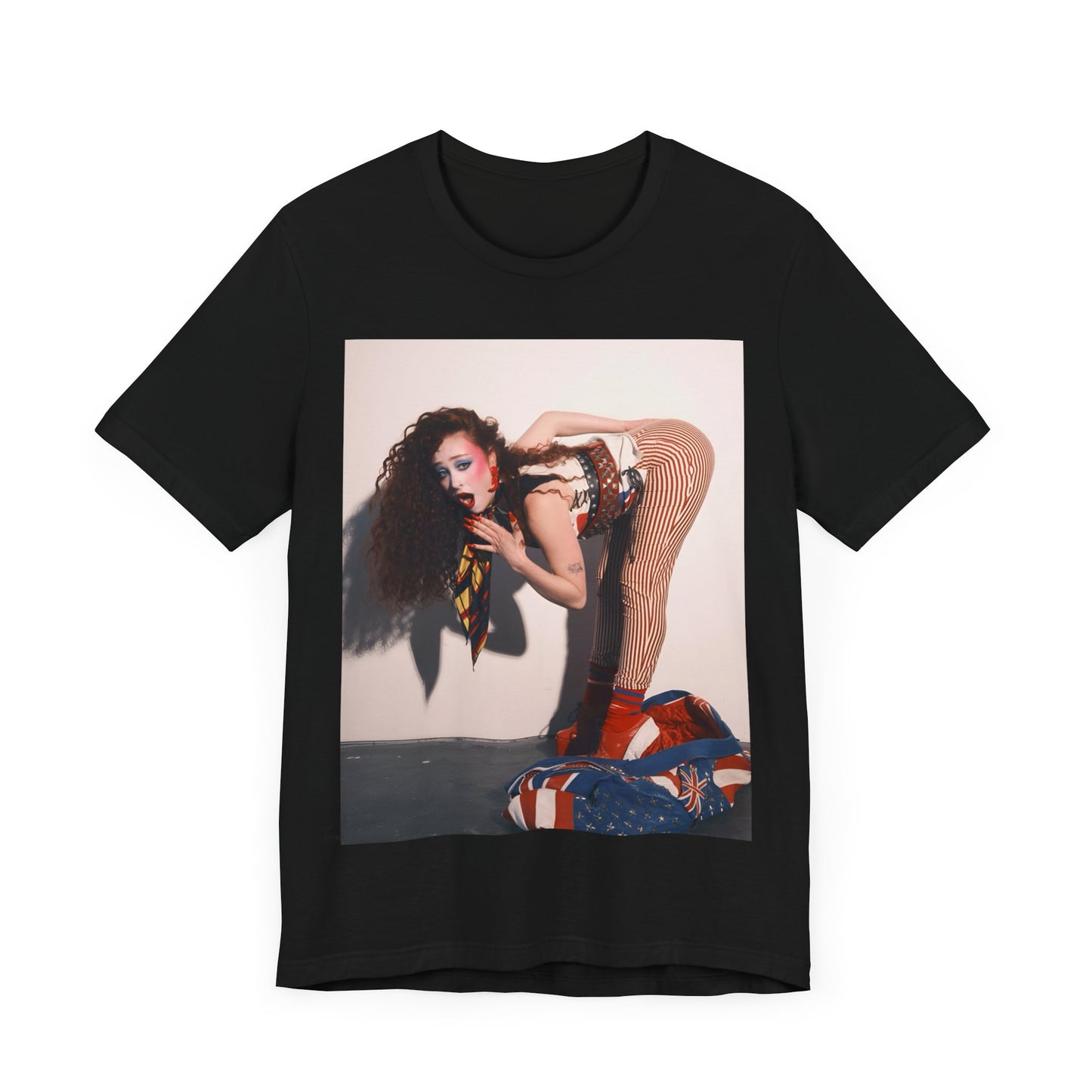 A black graphic t-shirt featuring a graphic of Chappell Roan with a 'Hot to Go!' theme, emphasizing her drag icon persona.