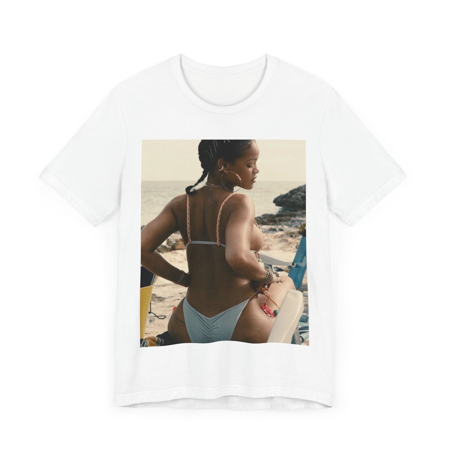 A black graphic t-shirt featuring a graphic of Rihanna as a bikini babe in paradise.