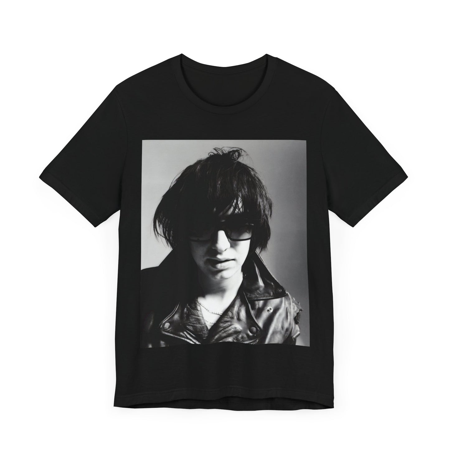 A black graphic t-shirt featuring a graphic related to The Strokes' 'Reptilia' song or era.