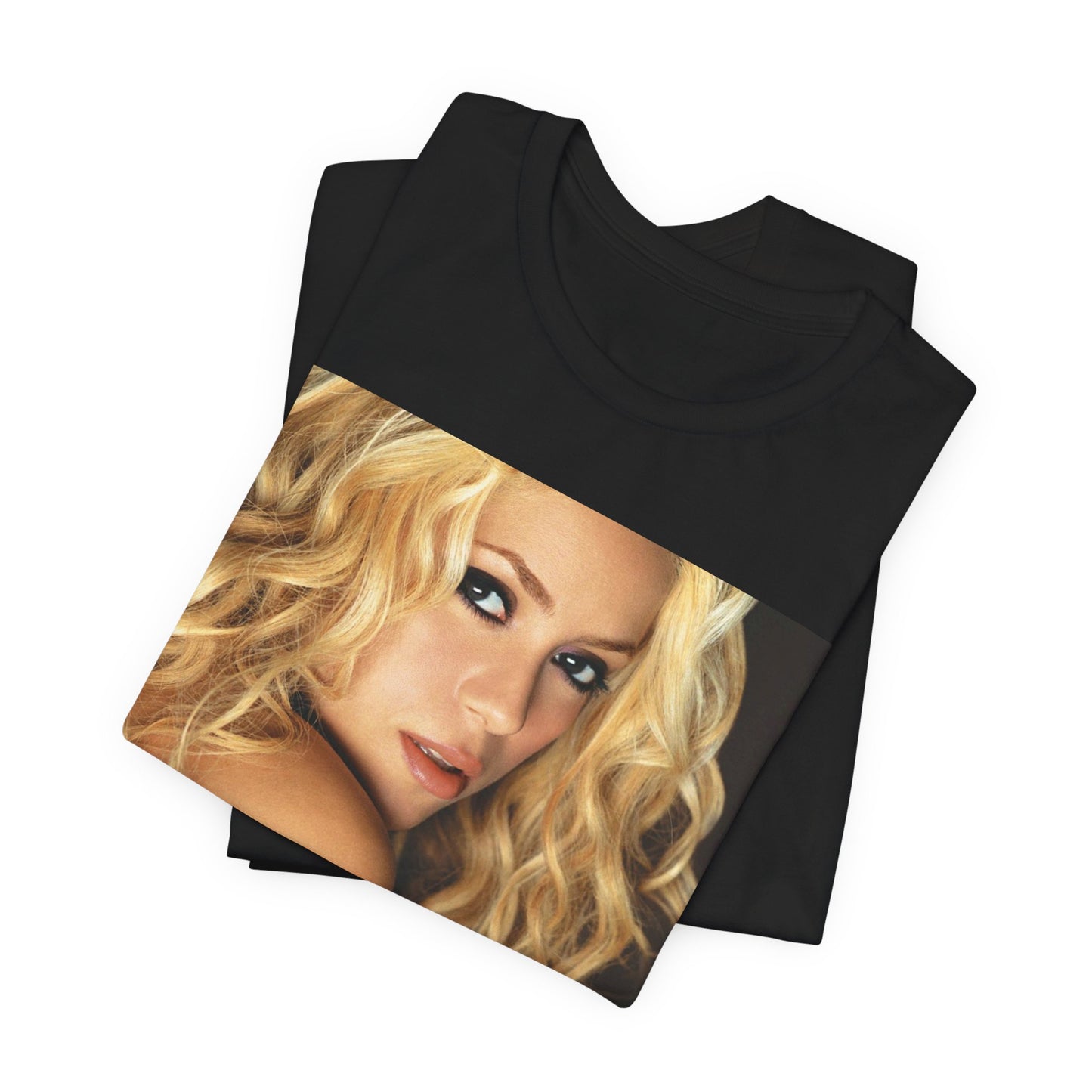 A black graphic t-shirt featuring a glamorous portrait graphic of Shakira.