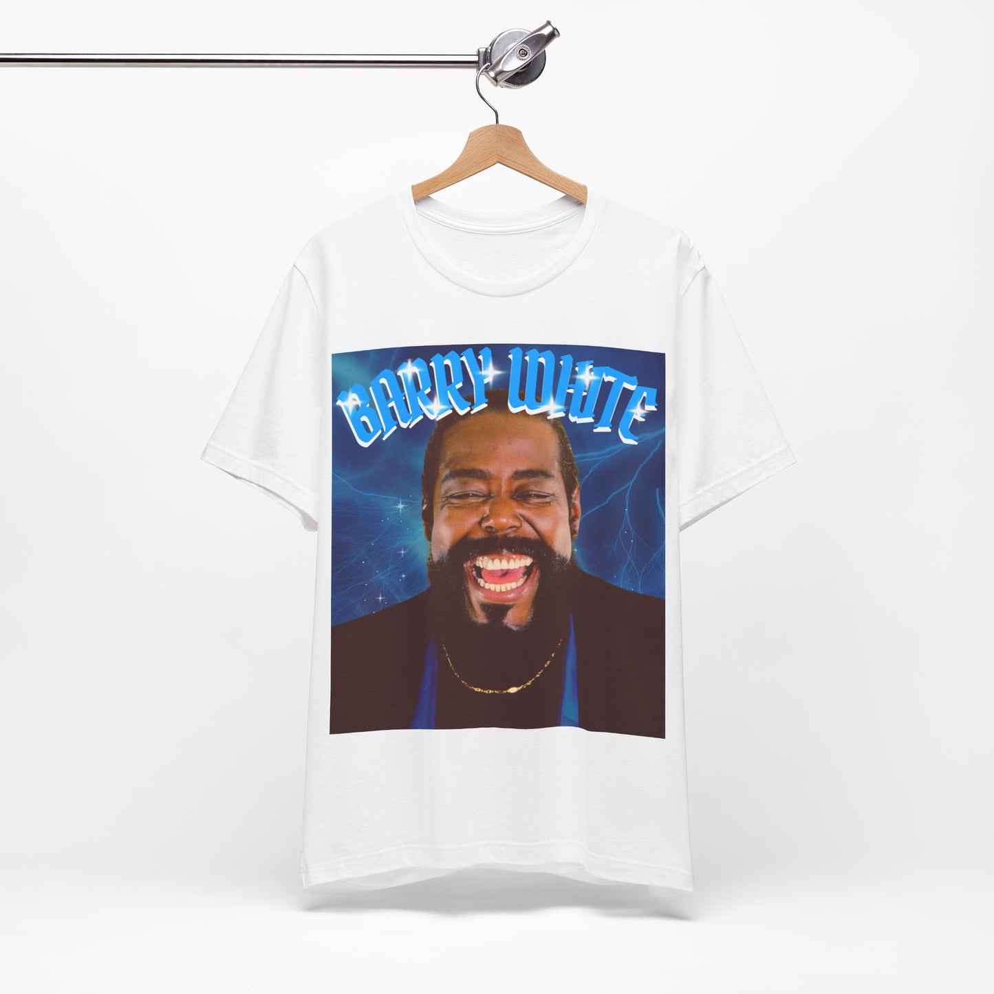A black graphic t-shirt featuring a vintage 70s-style graphic of Barry White, emphasizing his smooth, iconic look.