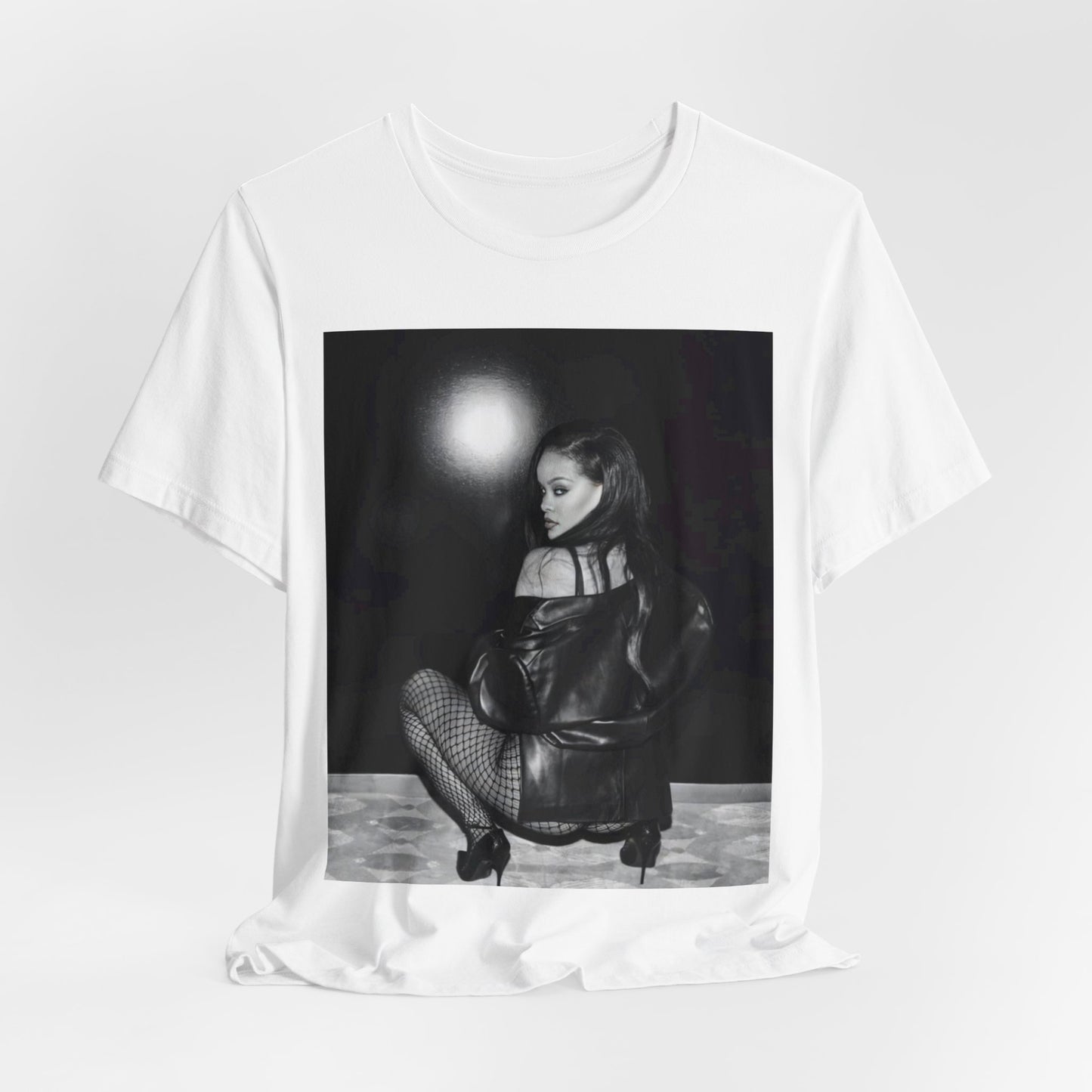 A black graphic t-shirt featuring a black and white sexy graphic of Rihanna.