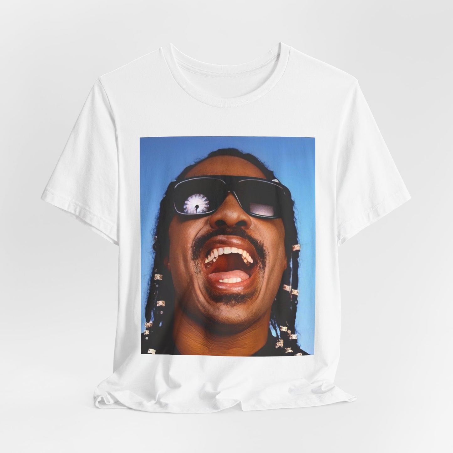 A black graphic t-shirt featuring a bold soul superstar graphic of Stevie Wonder.