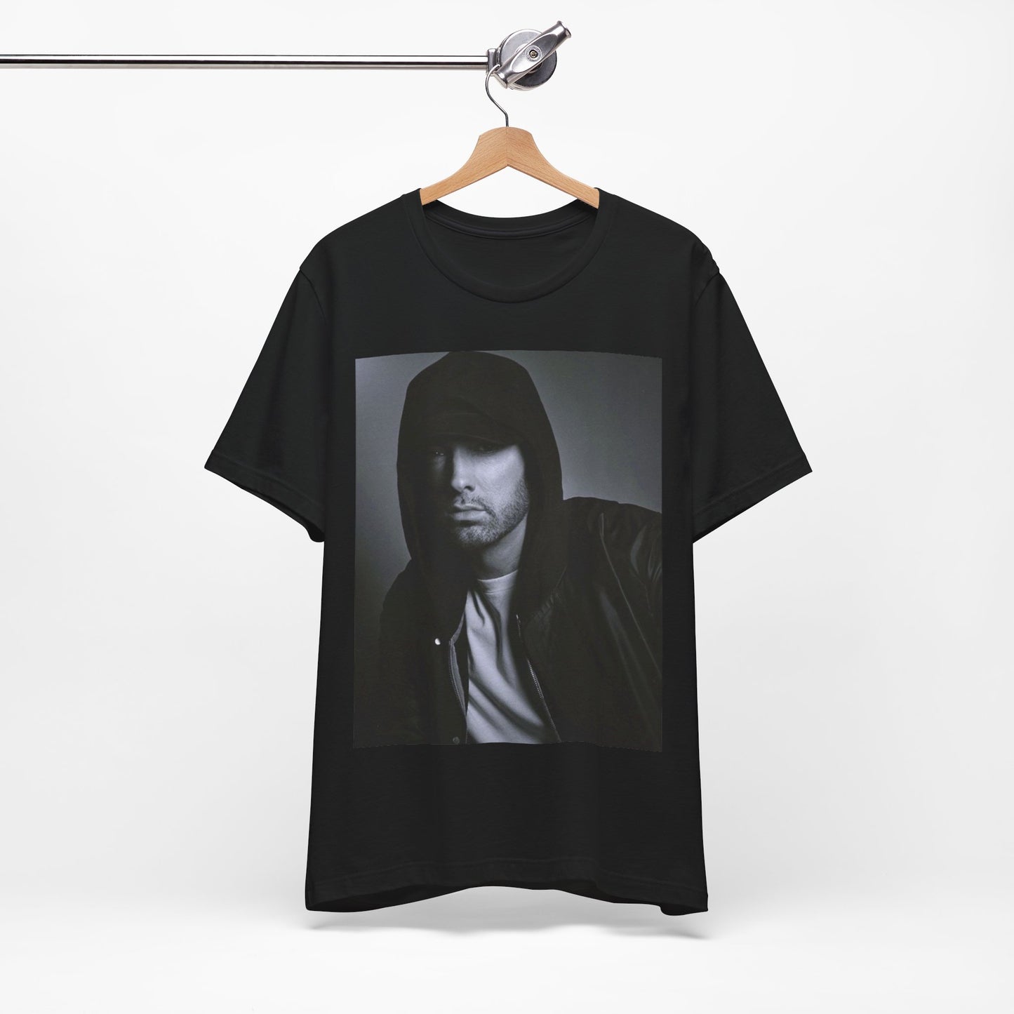 A black graphic t-shirt featuring a black and white, monochrome graphic or photo of Eminem.