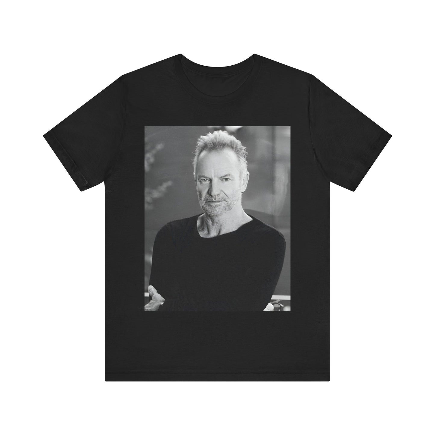 A black graphic t-shirt featuring a vintage graphic related to Sting's 'Desert Rose' song or era.
