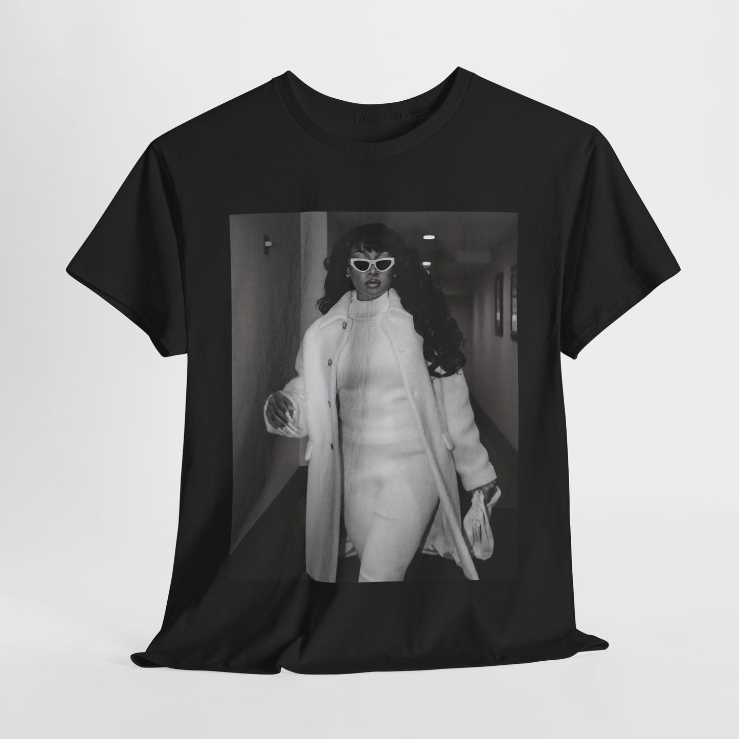 A black graphic t-shirt featuring a black and white portrait photo of Megan Thee Stallion.