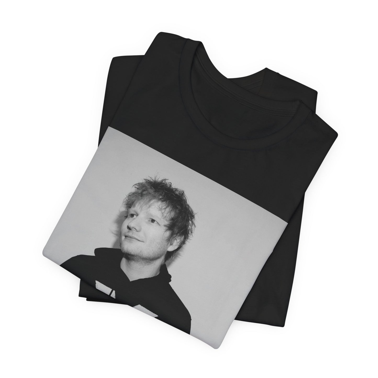 A black graphic t-shirt featuring a black and white graphic related to Ed Sheeran's album 'X'.