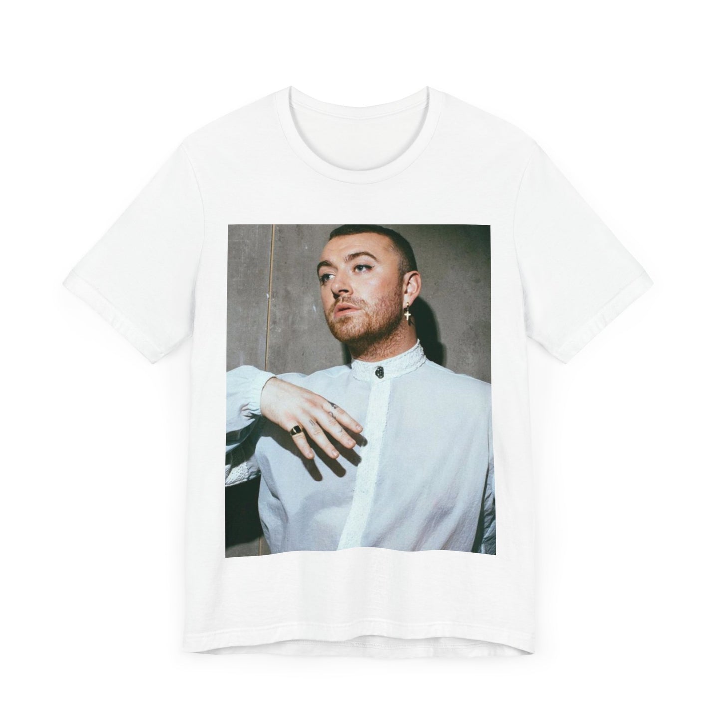 A black graphic t-shirt featuring a vintage graphic of Sam Smith emphasizing their soulful voice.
