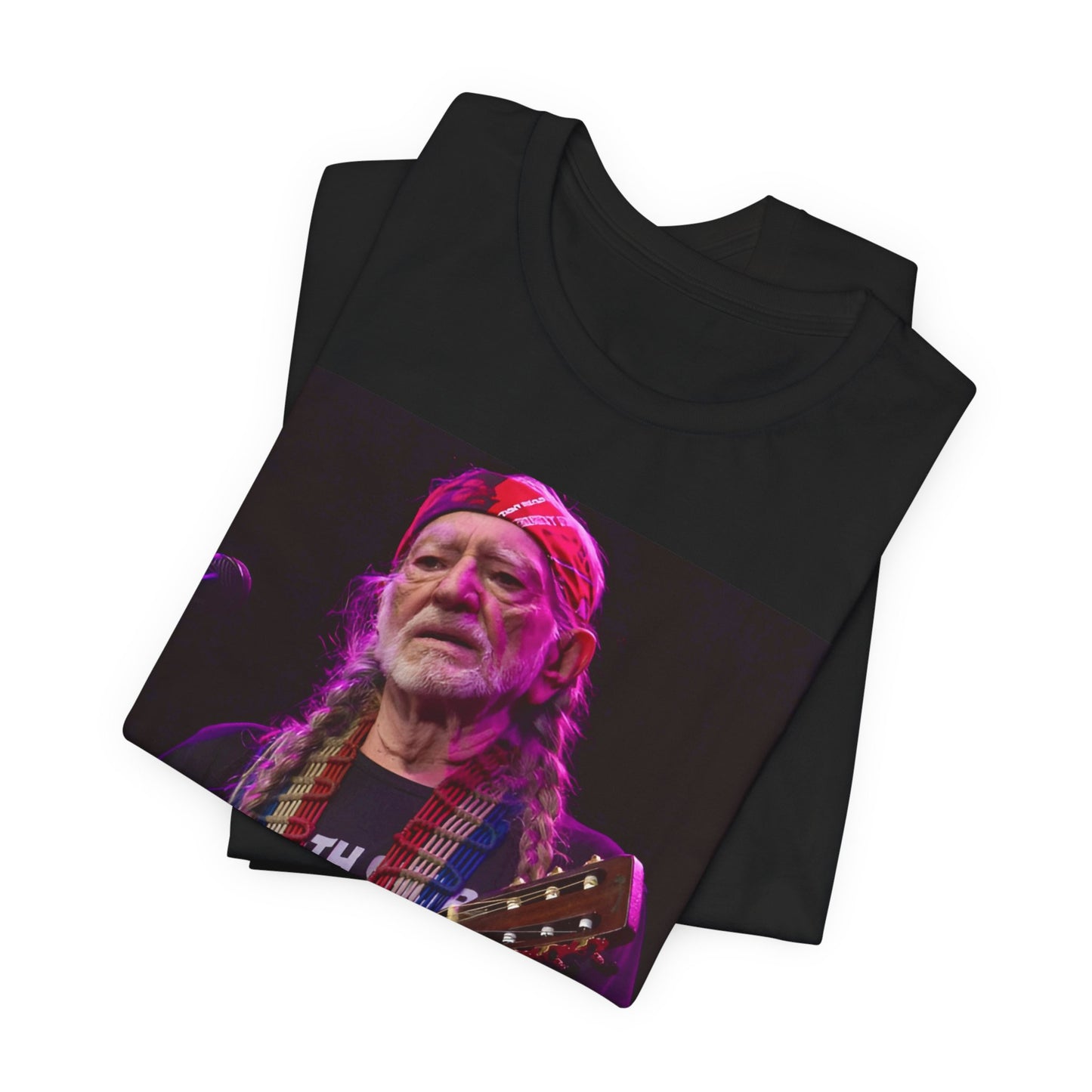 A black graphic t-shirt featuring an outlaw country legend graphic of Willie Nelson.