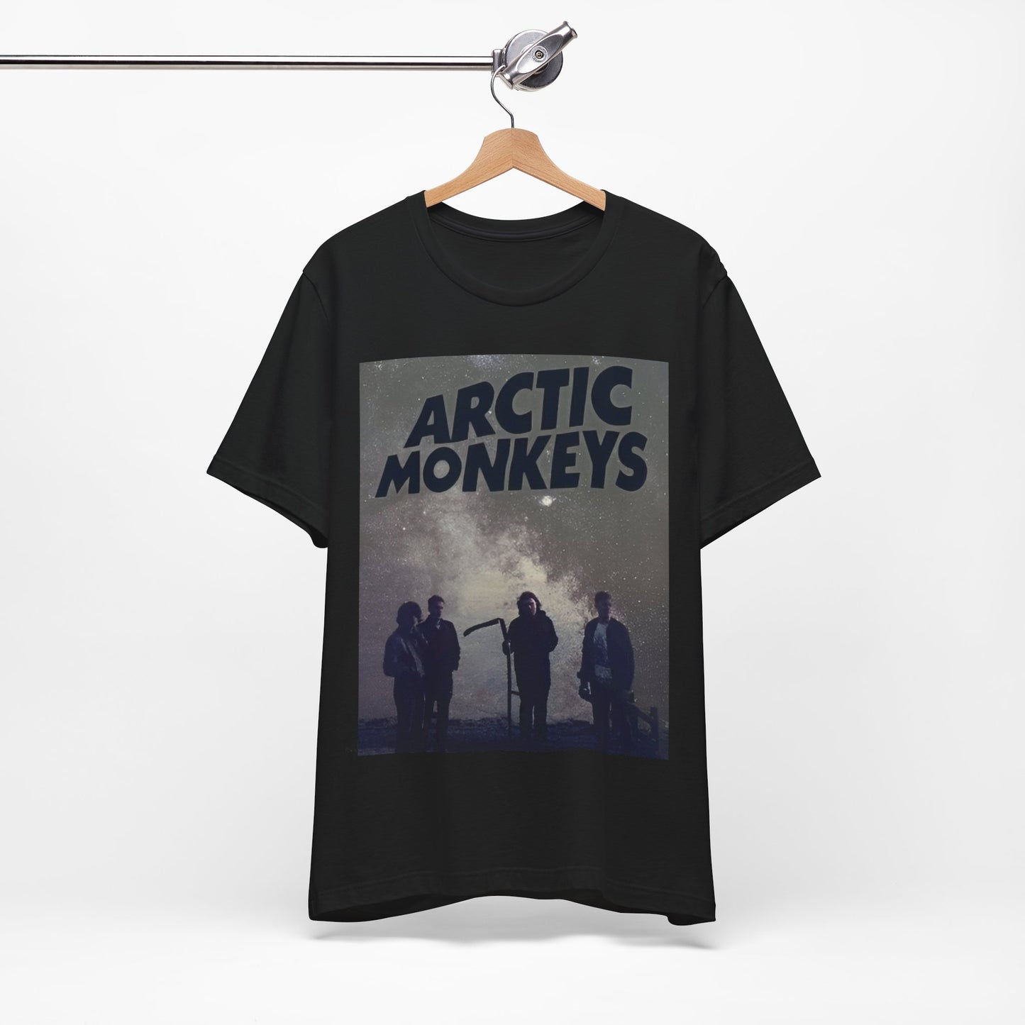 A black graphic t-shirt featuring an artistic or aesthetic graphic of the Arctic Monkeys band.