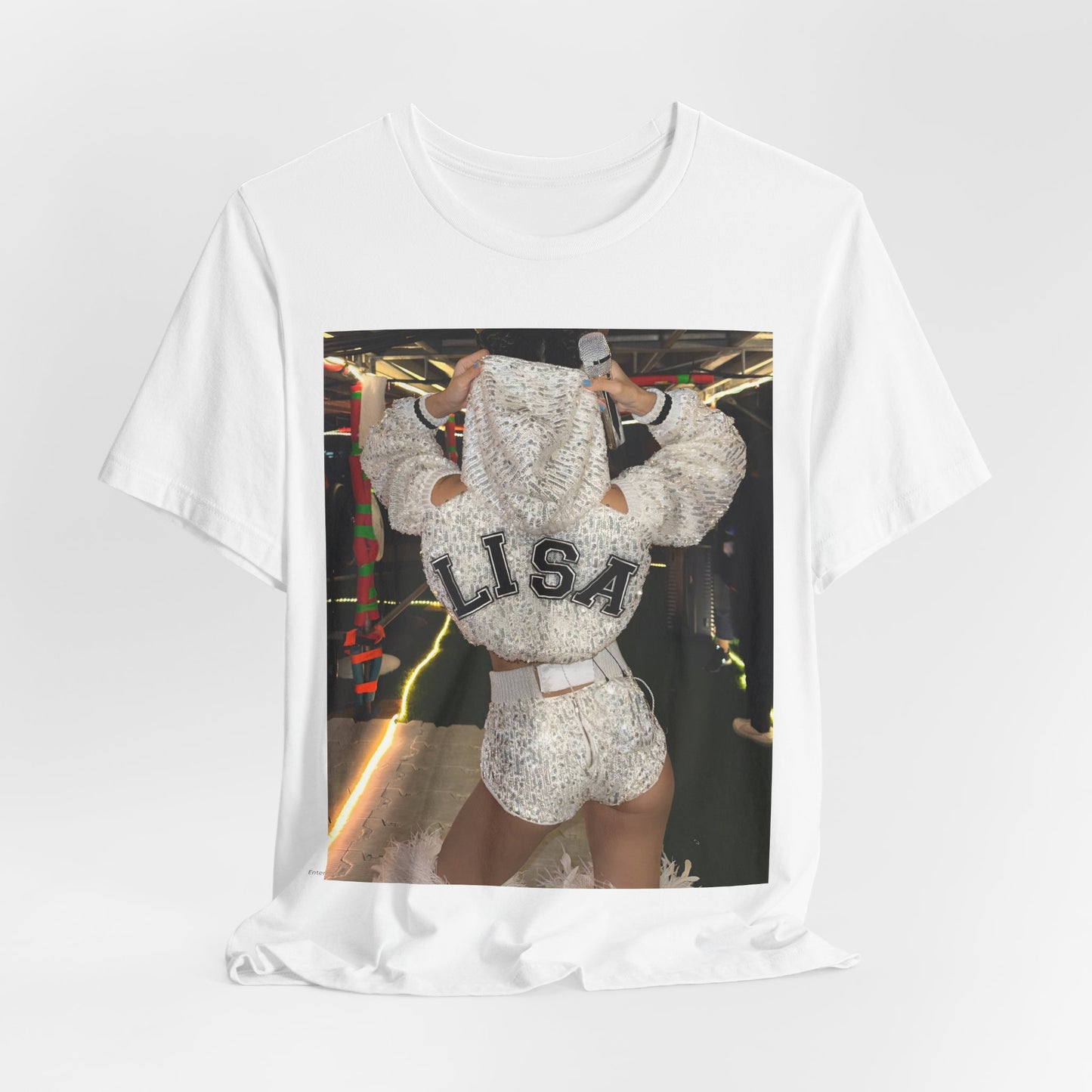 A black graphic t-shirt featuring a graphic or photo of Lisa in a backstage setting.