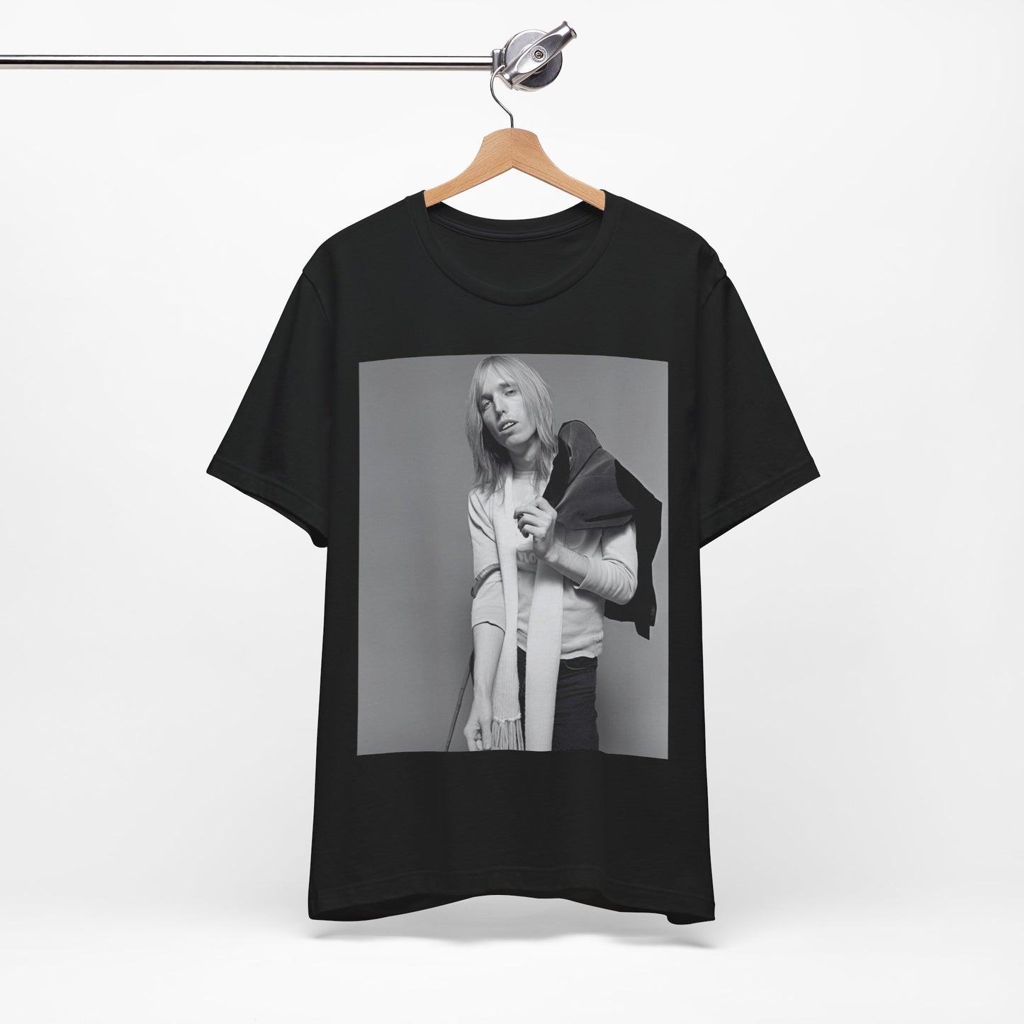 A black graphic t-shirt featuring a modern rock essential graphic of Tom Petty.