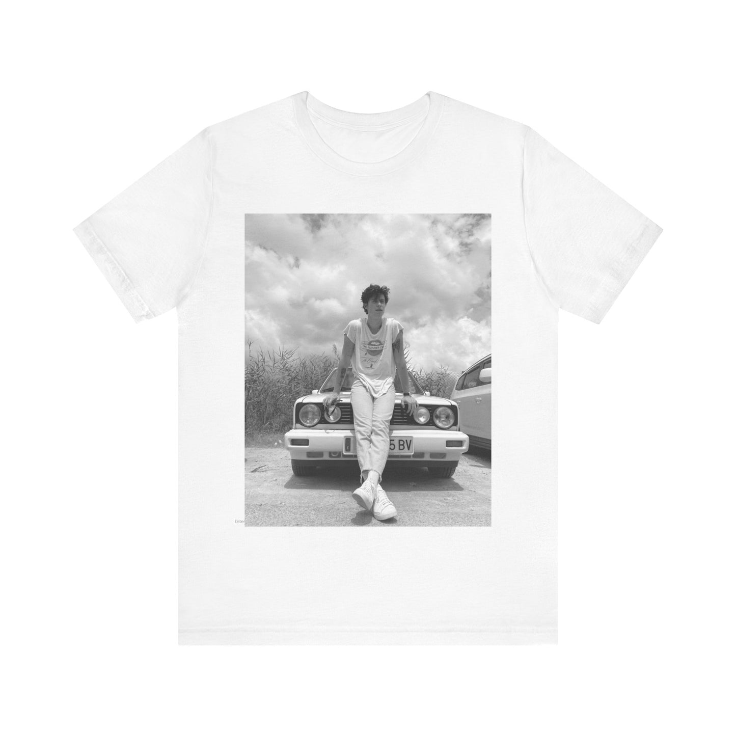 A black graphic t-shirt featuring a graphic of Shawn Mendes in an iconic tank top look.