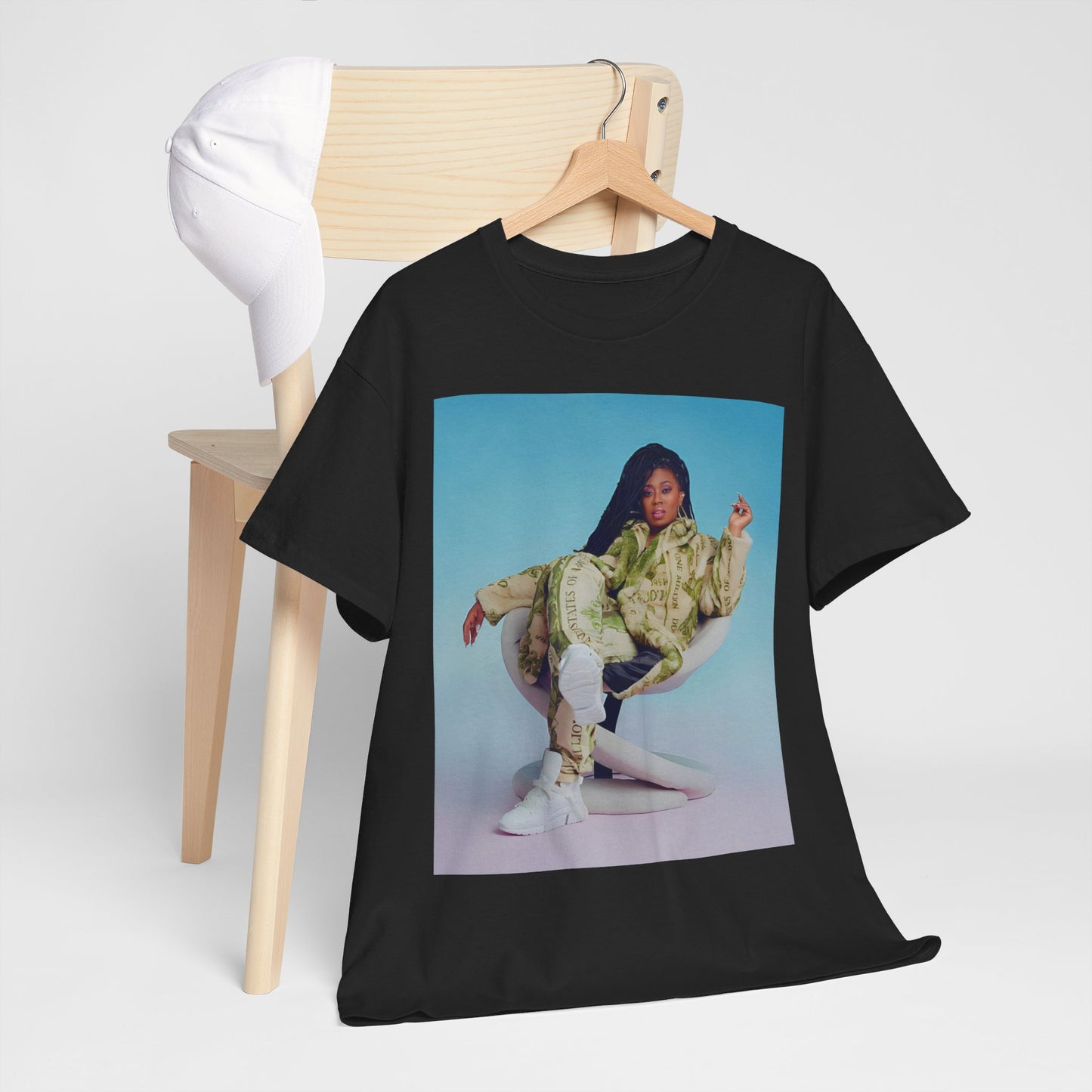 A black graphic t-shirt featuring a vintage graphic related to Missy Elliott's 'Work It' song or era.