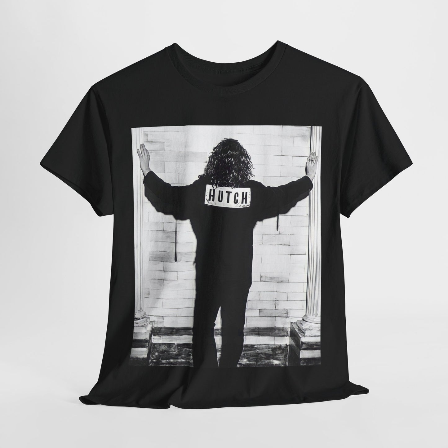 A black graphic t-shirt featuring a graphic of Michael Hutchence from INXS, labeled 'Hutch'.