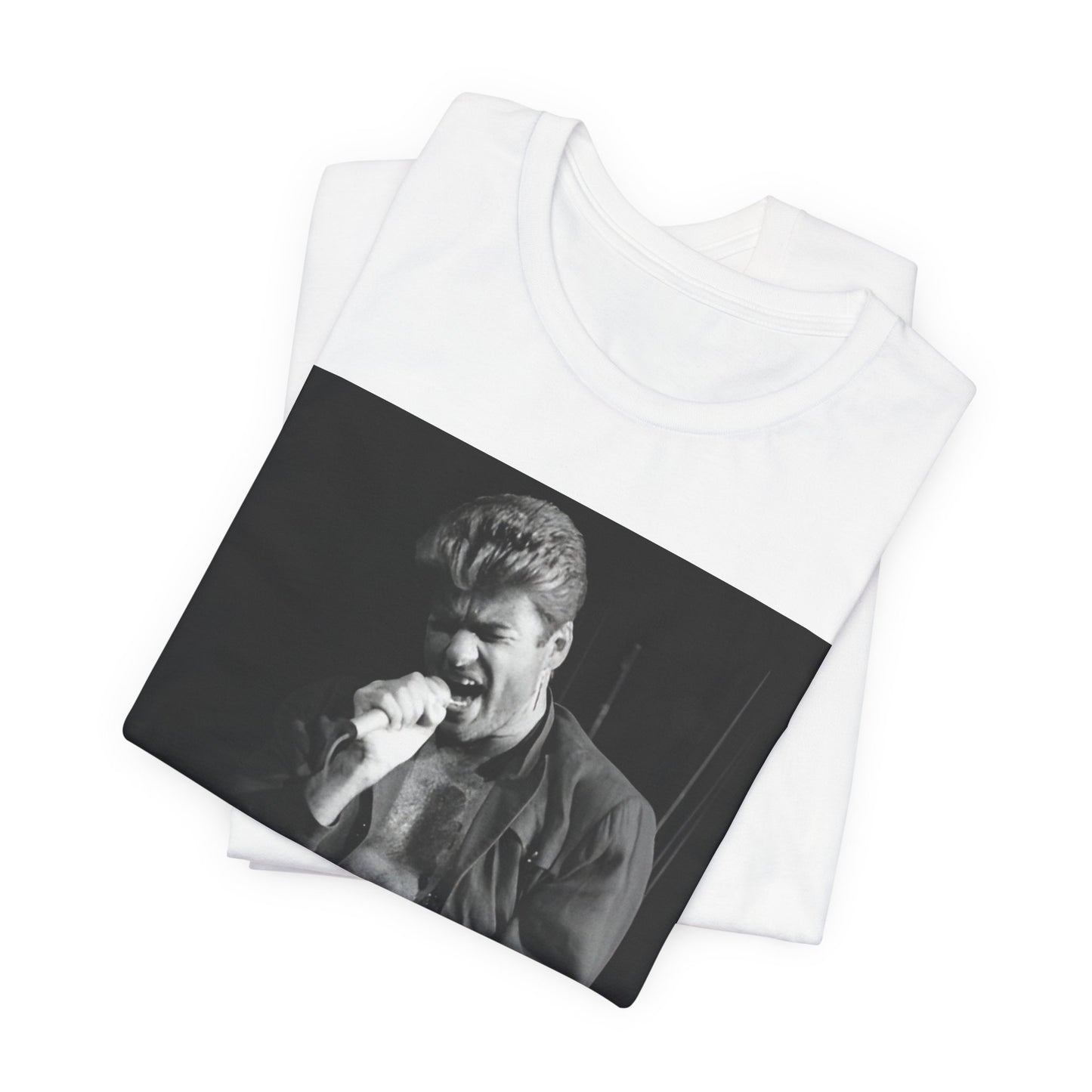A black graphic t-shirt featuring a glamorous photo or graphic of George Michael performing live.