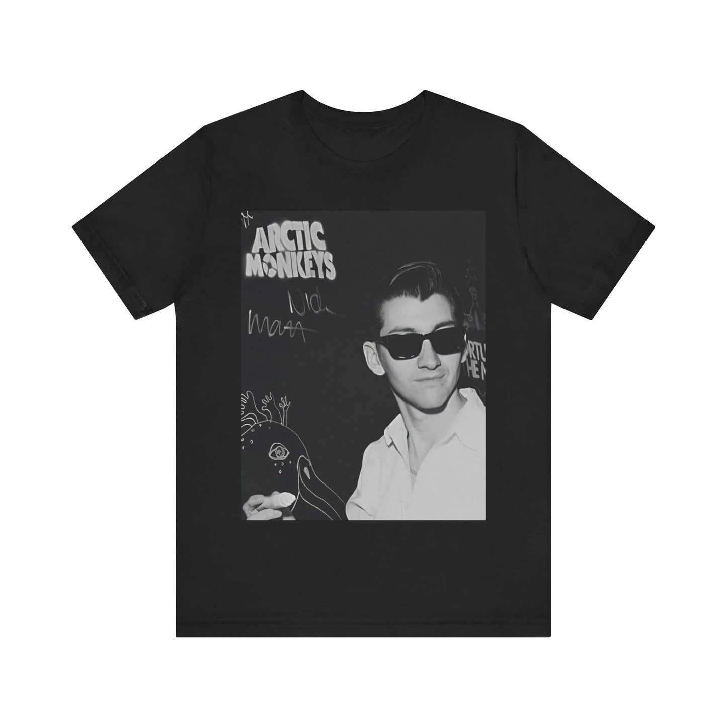 A black graphic t-shirt featuring a black and white portrait photo of Alex Turner from Arctic Monkeys, showing his signature look.
