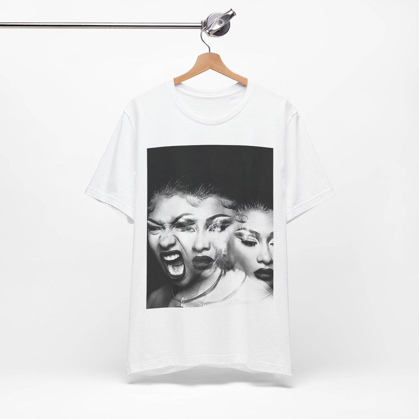 A black graphic t-shirt featuring a graphic related to Megan Thee Stallion's 'Traumazine' album.
