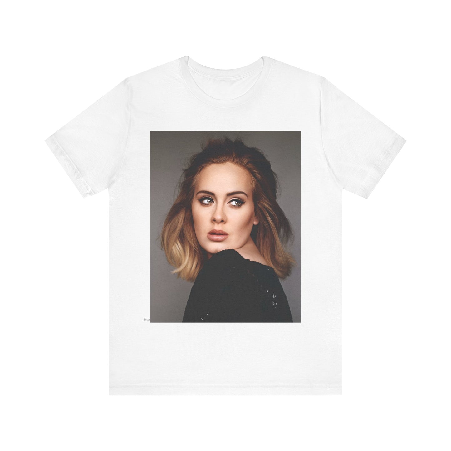 A black graphic t-shirt featuring a studio portrait of Adele from her '25' album era, showing a thoughtful or serene expression.