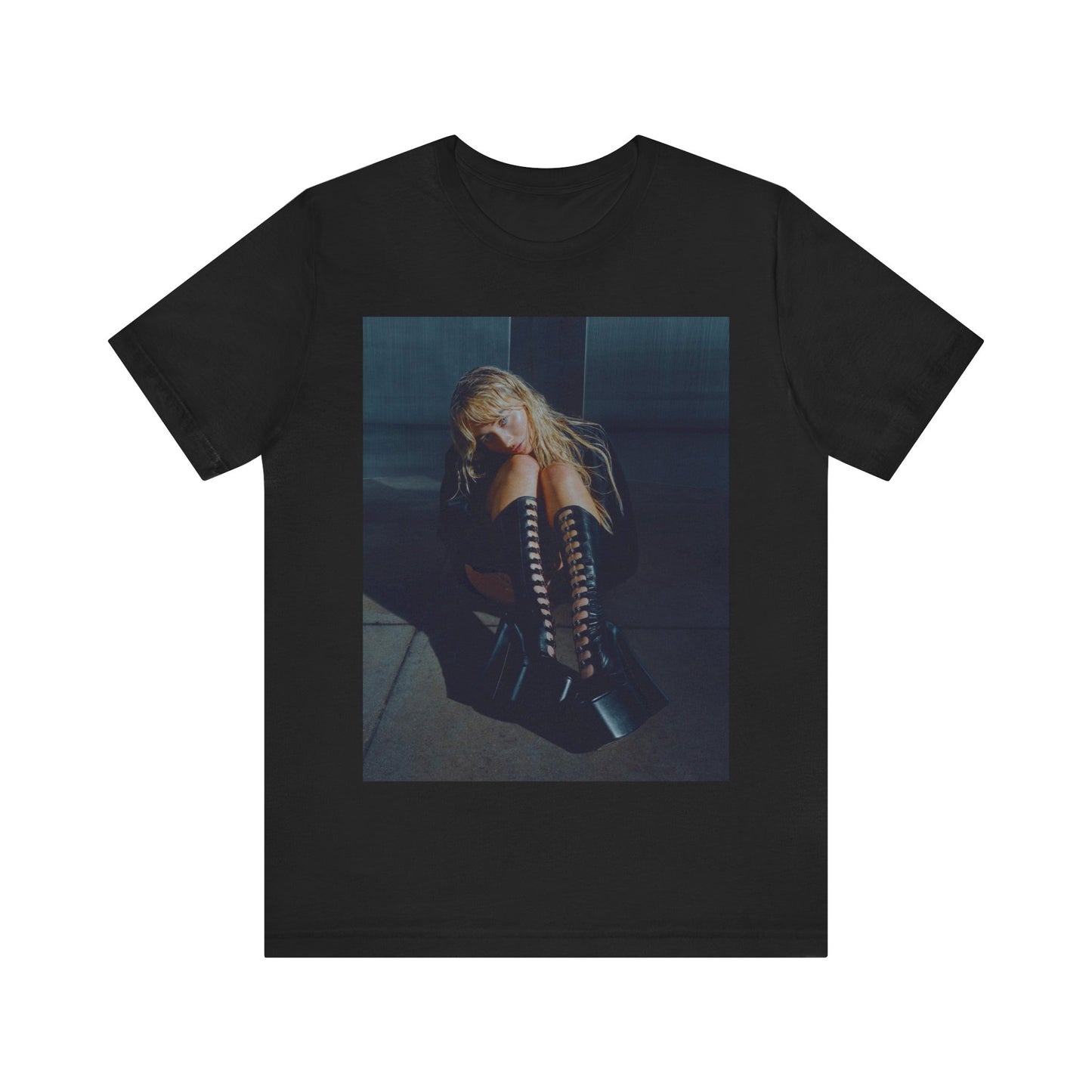 A black graphic t-shirt featuring a bold graphic of Sabrina Carpenter as a pop superstar.