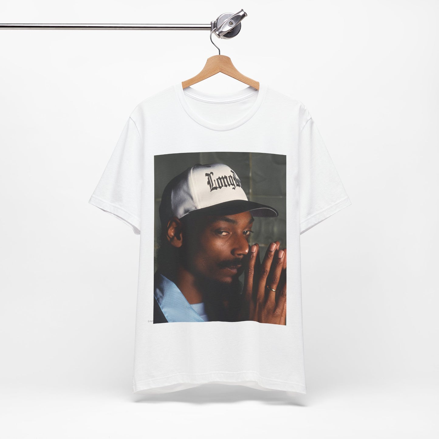 A black graphic t-shirt featuring a graphic of Snoop Dogg with a boxy 'Doggfather' vibe.