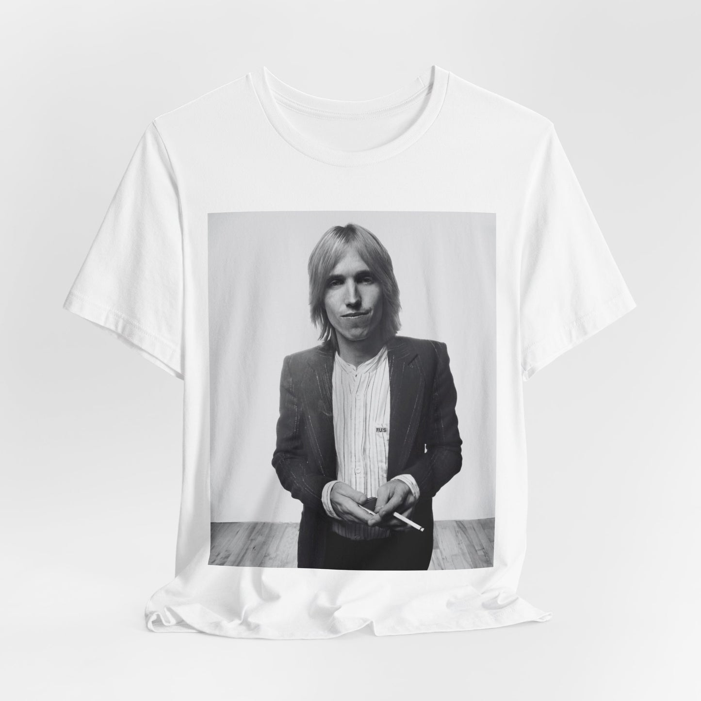 A black graphic t-shirt featuring a graphic of Tom Petty with rock legend vibes.