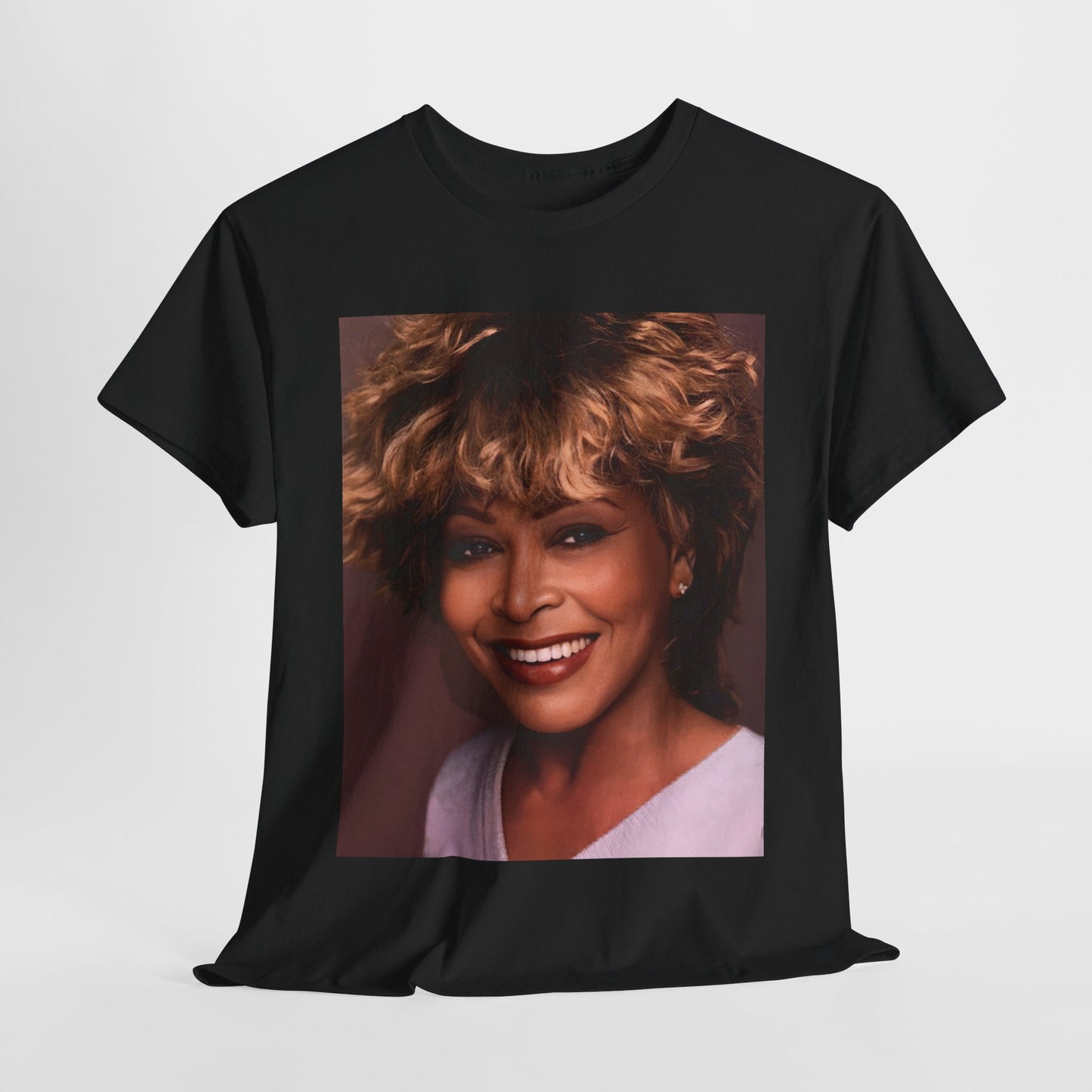 A black graphic t-shirt featuring a vintage soul rock icon graphic of Tina Turner.