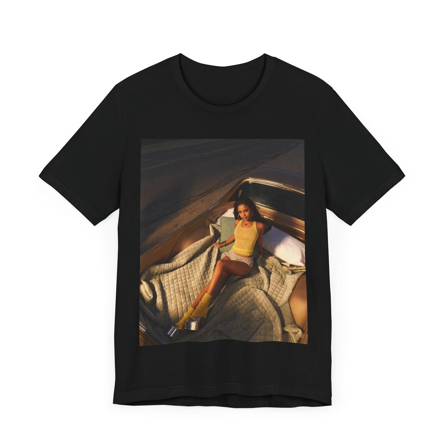 A black graphic t-shirt featuring a graphic of Tyla as an African fashion icon.