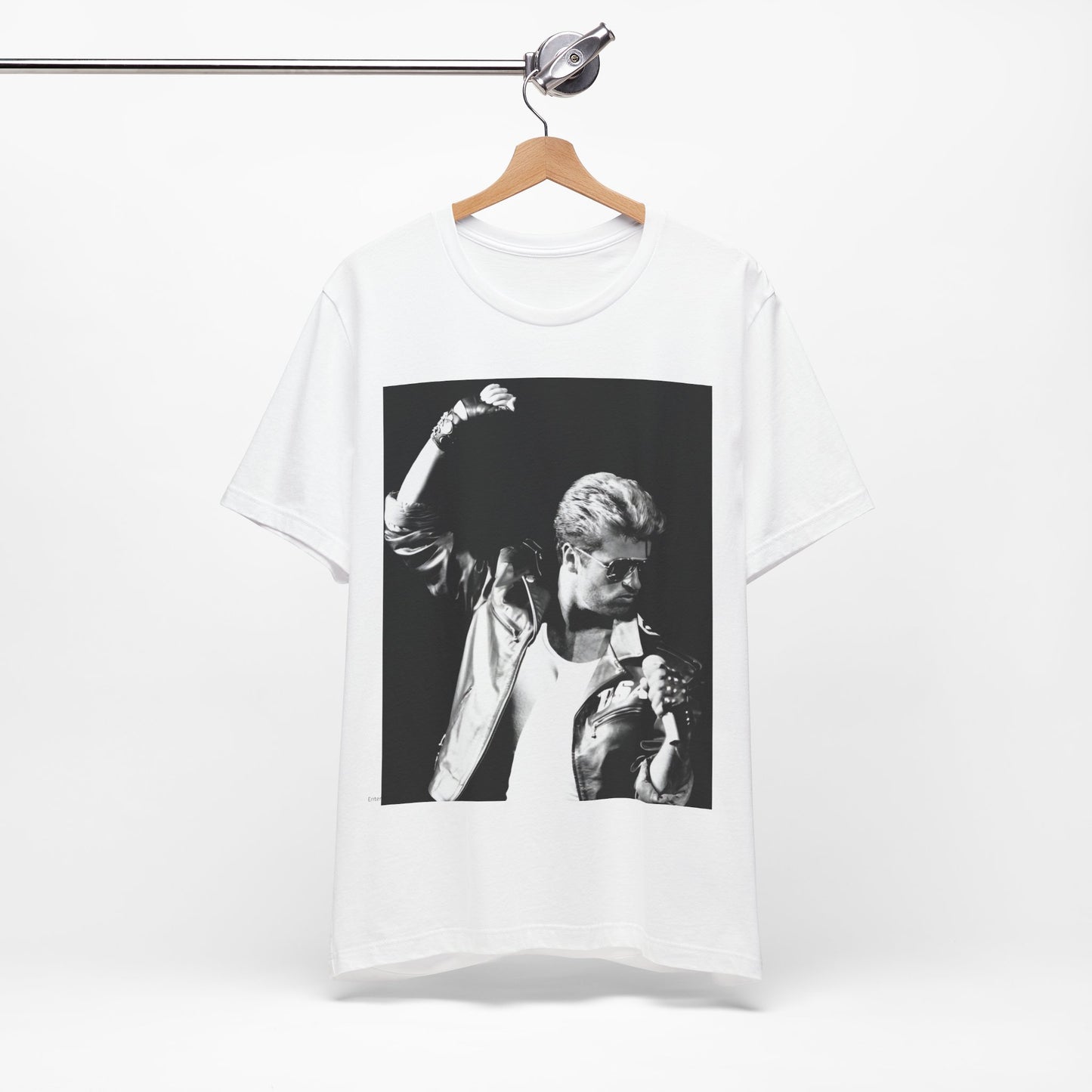A black graphic t-shirt featuring a black and white photo of George Michael from his 'Faith' album era.
