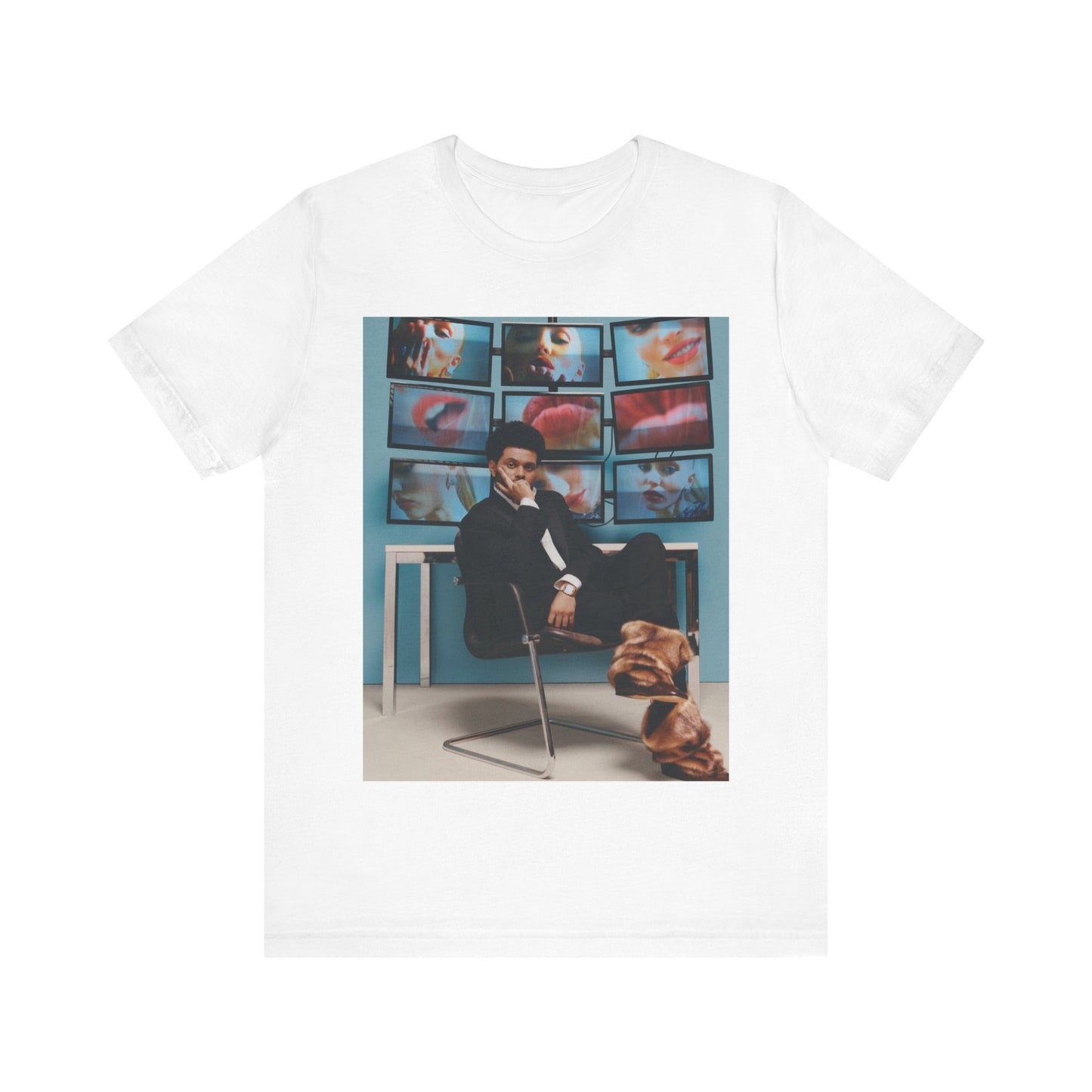 A black graphic t-shirt featuring an aesthetic graphic of The Weeknd.