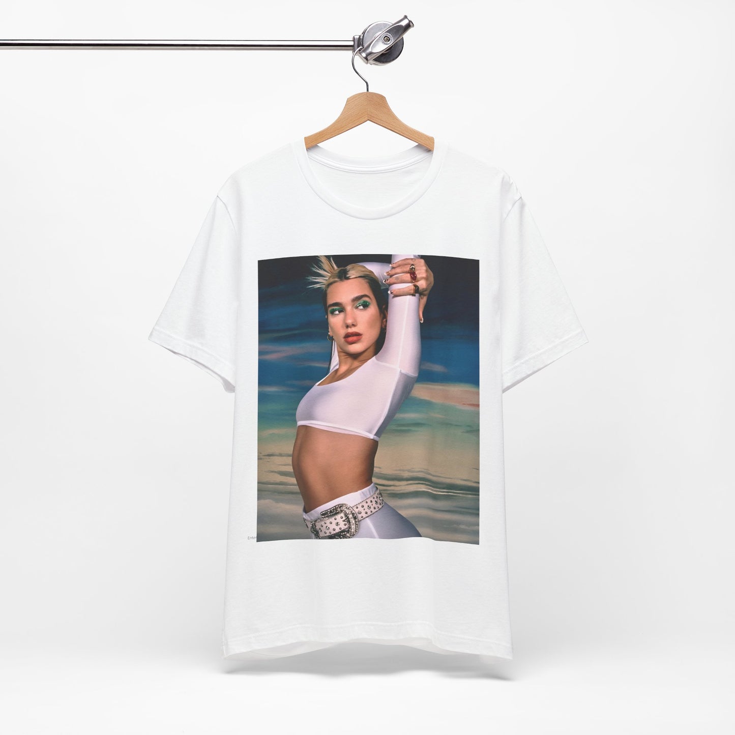A black graphic t-shirt featuring a stylized graphic of Dua Lipa as a modern pop sensation.