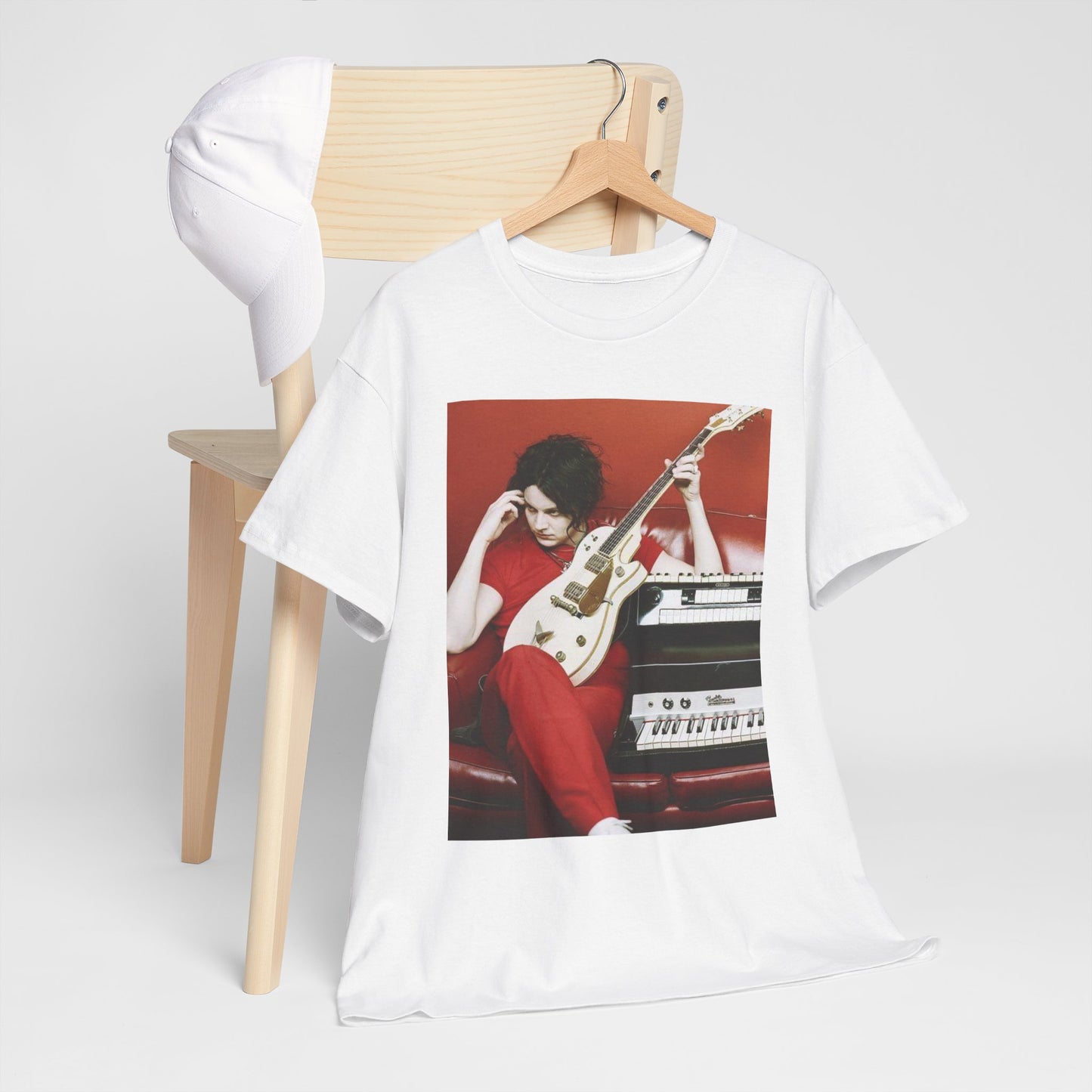 A black graphic t-shirt featuring a retro graphic of The White Stripes with a garage rock aesthetic.