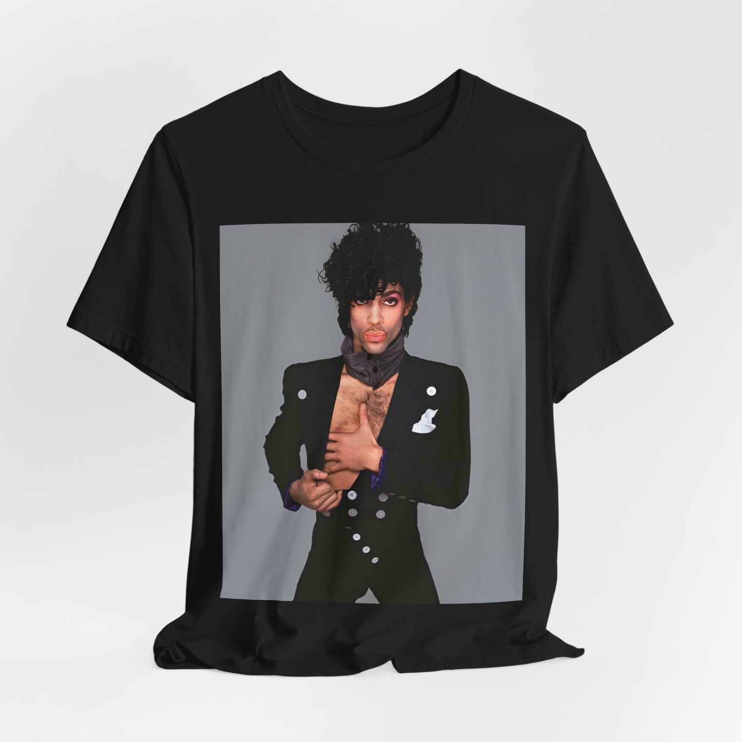A black graphic t-shirt featuring a 90s vintage funk pop icon graphic of Prince.