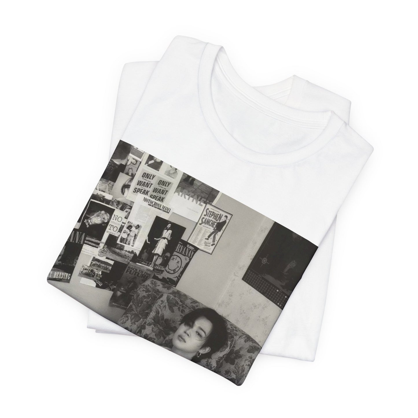 A black graphic t-shirt featuring a black and white portrait photo of Jimin.