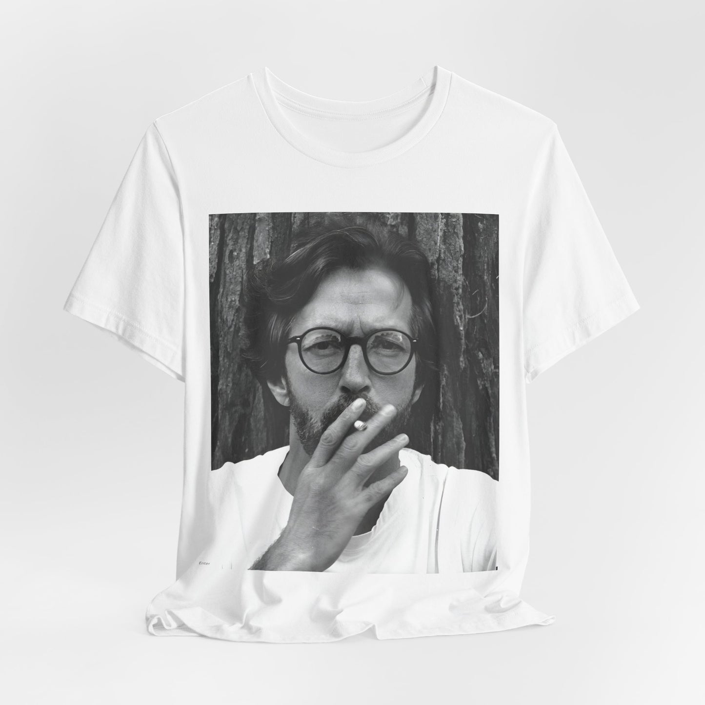 A black graphic t-shirt featuring a graphic related to Eric Clapton's classic Cream era.