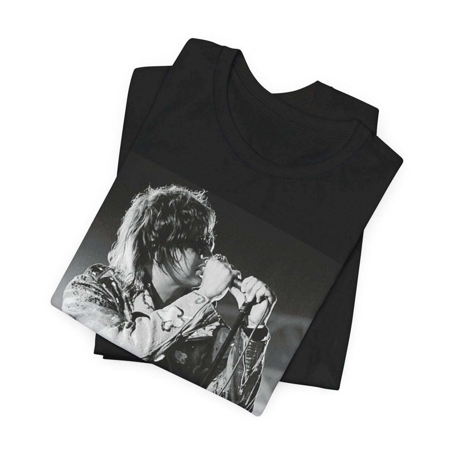 A black graphic t-shirt featuring a vintage graphic related to The Strokes' 'Last Nite' song or era.