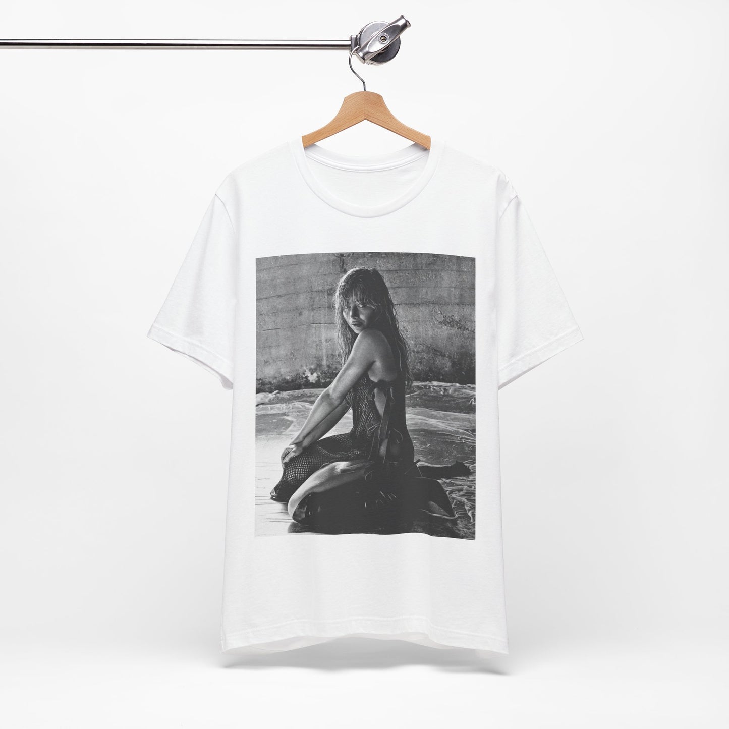 A black graphic t-shirt featuring a black and white, monochrome graphic or photo of Sabrina Carpenter.
