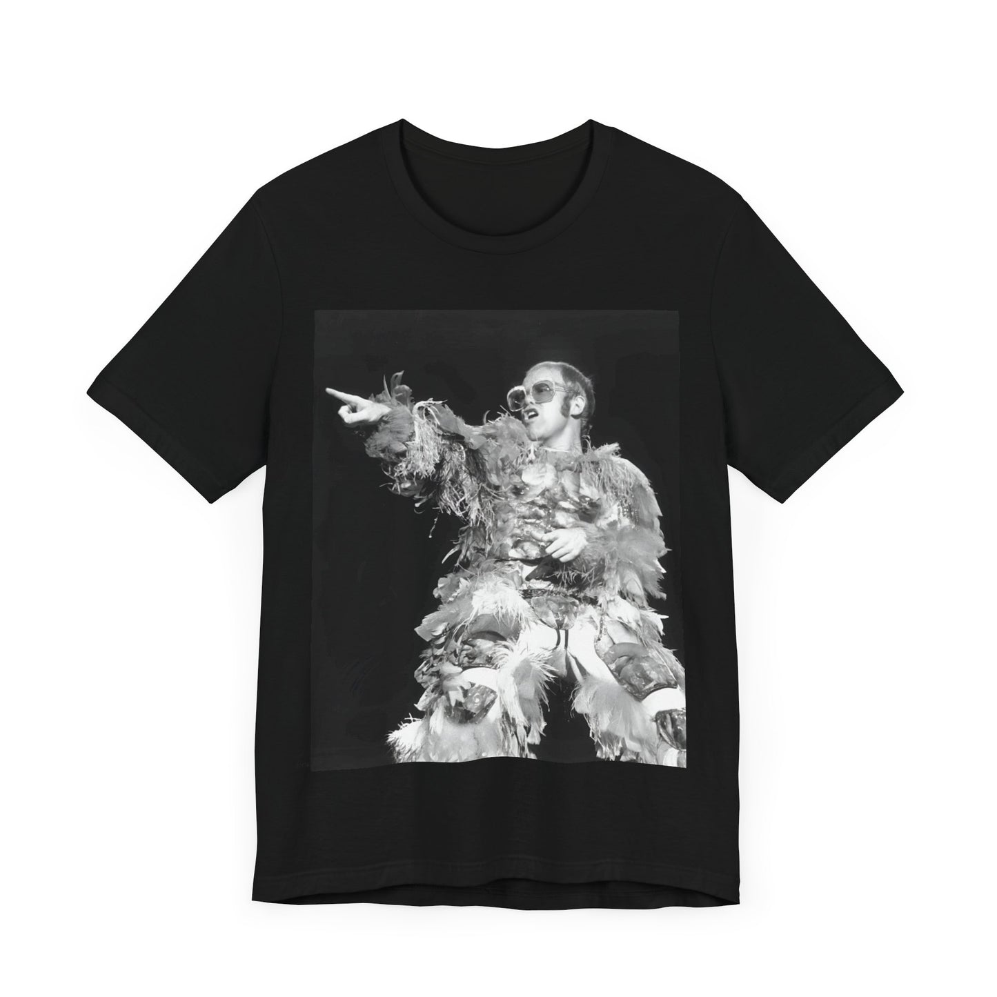A black graphic t-shirt featuring a retro graphic of Elton John as a rock legend performing live.