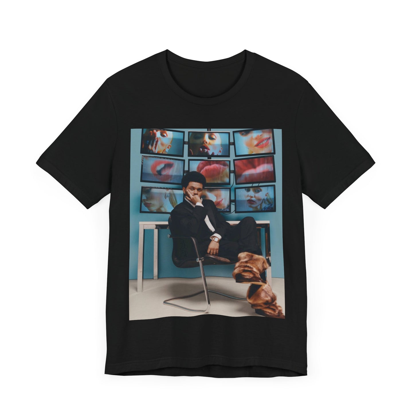 A black graphic t-shirt featuring an aesthetic graphic of The Weeknd.