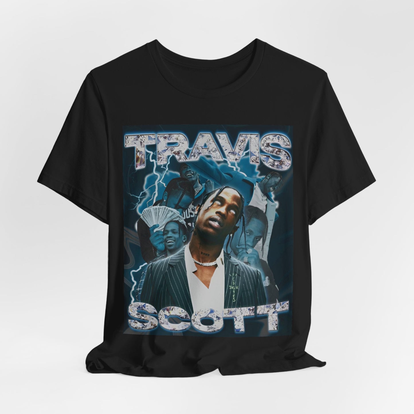 A black graphic t-shirt featuring a 90s bootleg style graphic of Travis Scott.