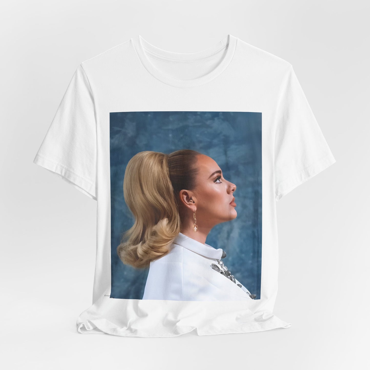 A black graphic t-shirt featuring a black and white photo of Adele in a vintage glamorous look, with classic hair and makeup.