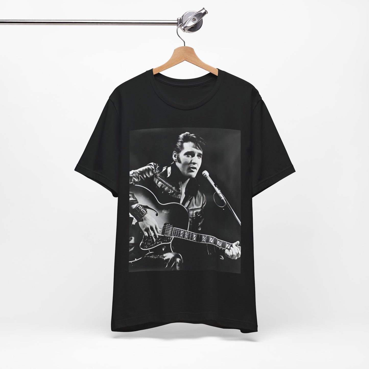 A black graphic t-shirt featuring a graphic related to Elvis Presley's 'Burning Love' song or era.