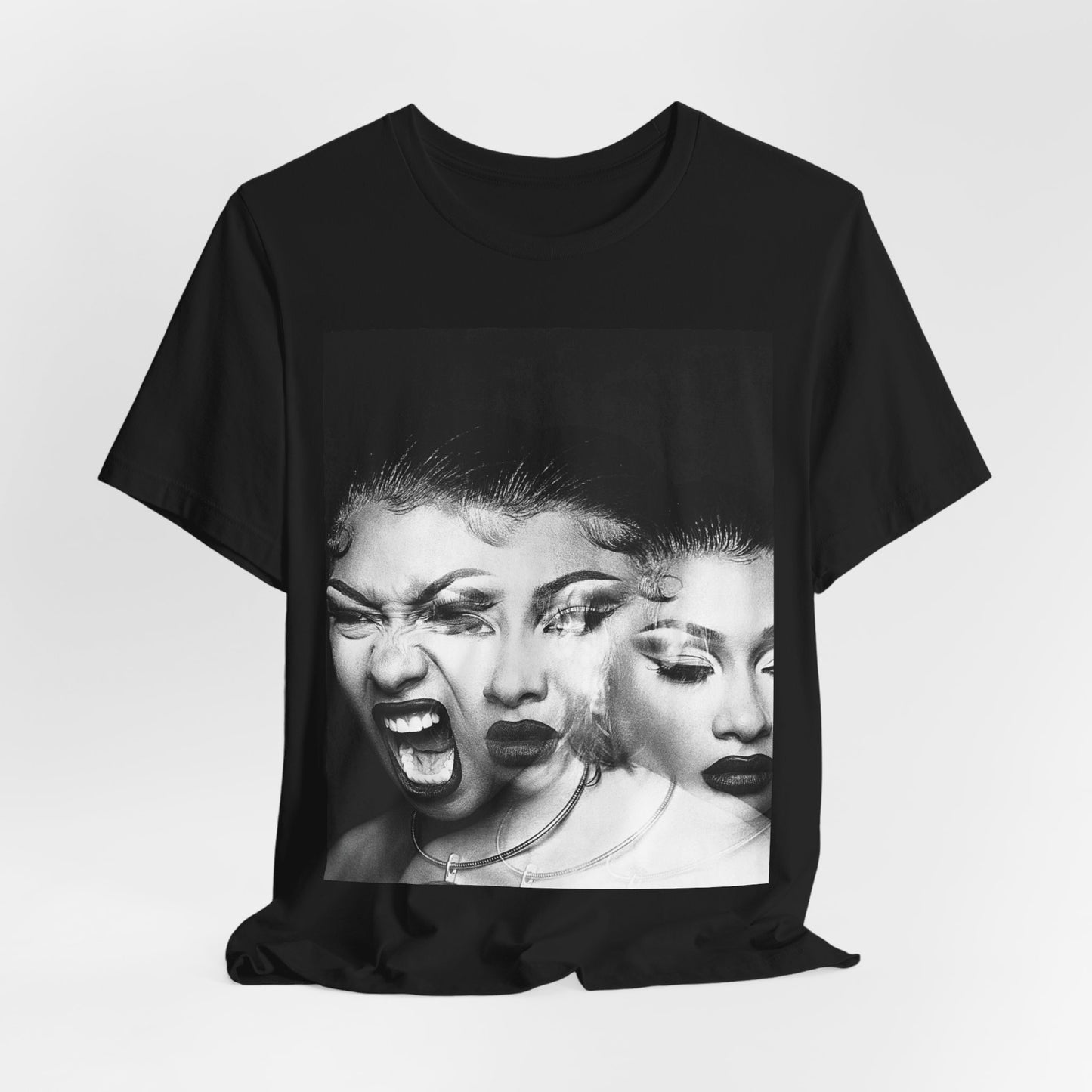 A black graphic t-shirt featuring a graphic related to Megan Thee Stallion's 'Traumazine' album.