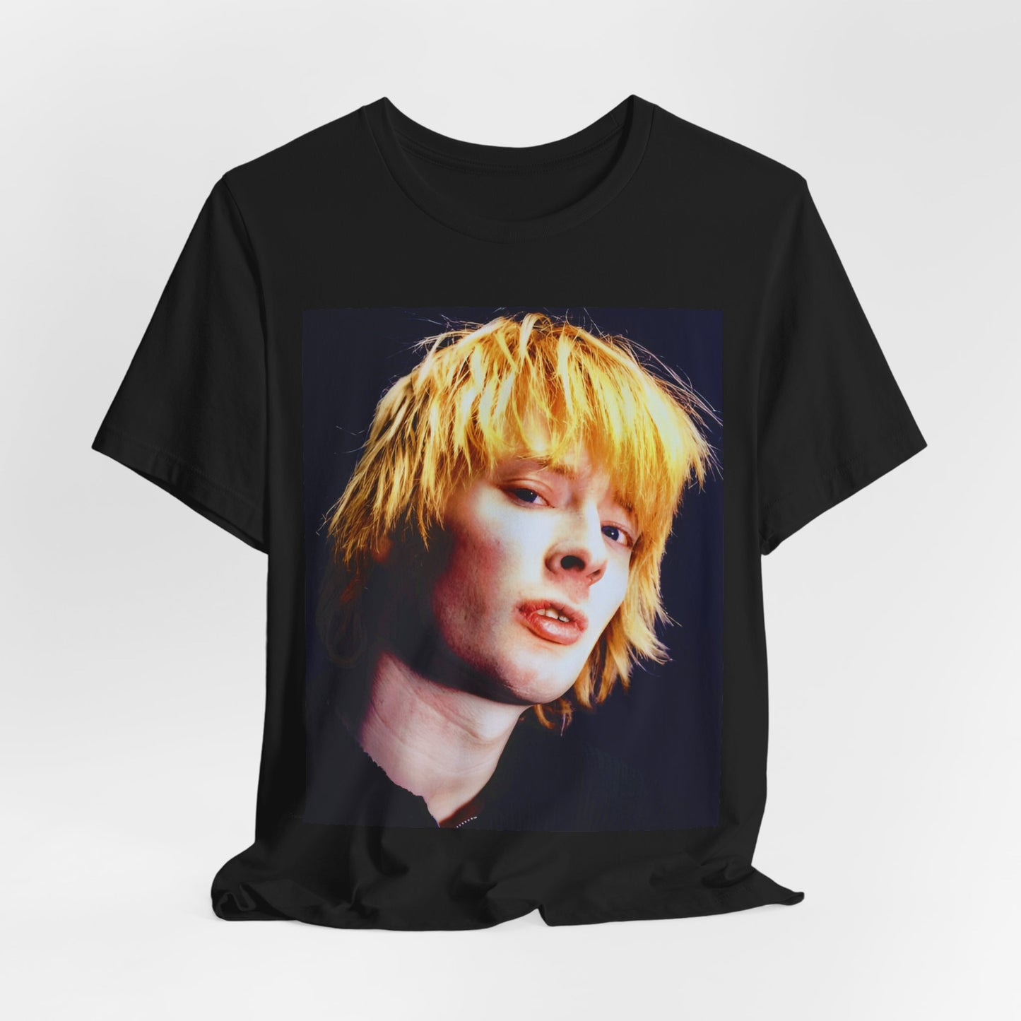A black graphic t-shirt featuring an aesthetic graphic of Thom Yorke from Radiohead.