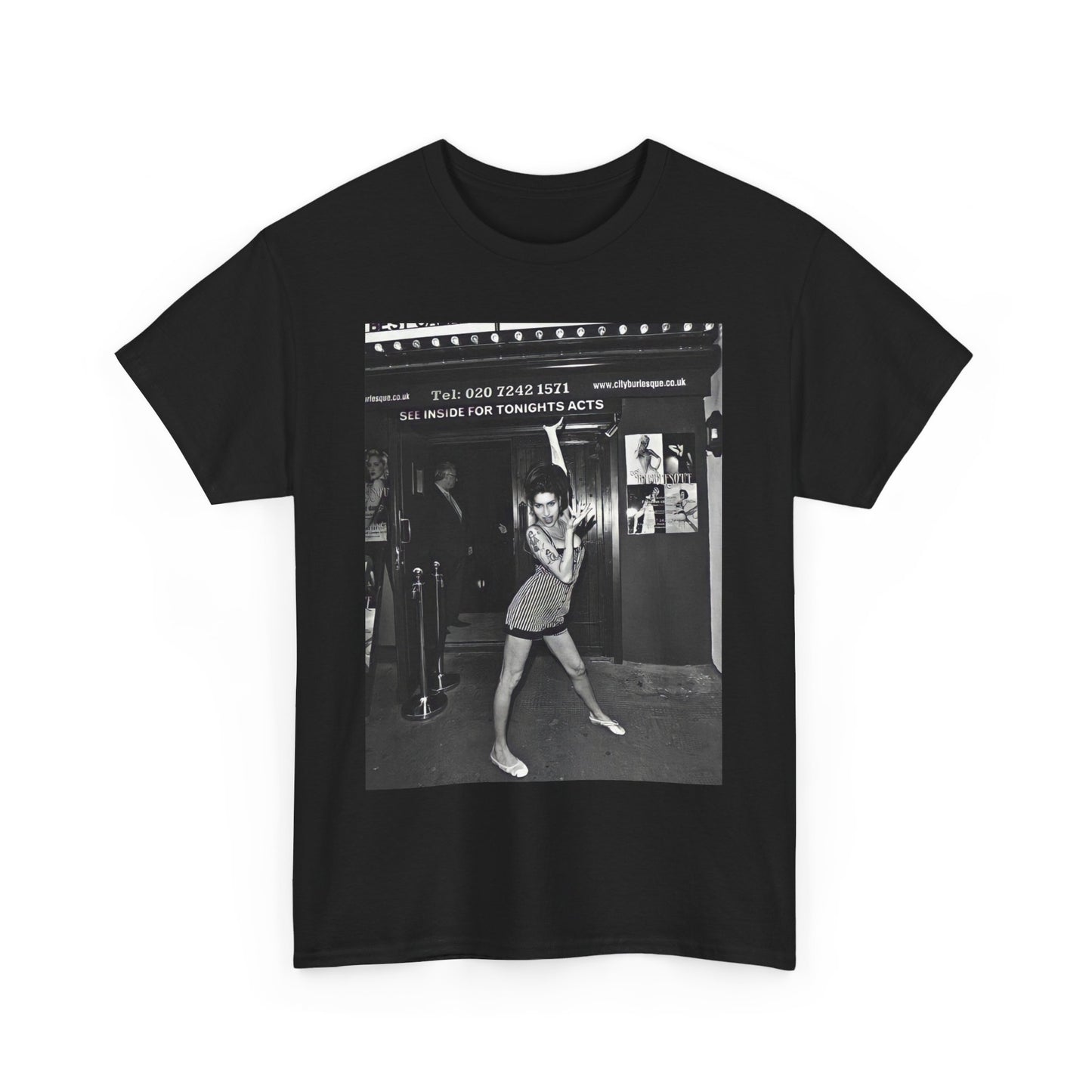 A black graphic t-shirt featuring a black and white graphic of Amy Winehouse in a burlesque club setting, stylized to evoke that ambiance.